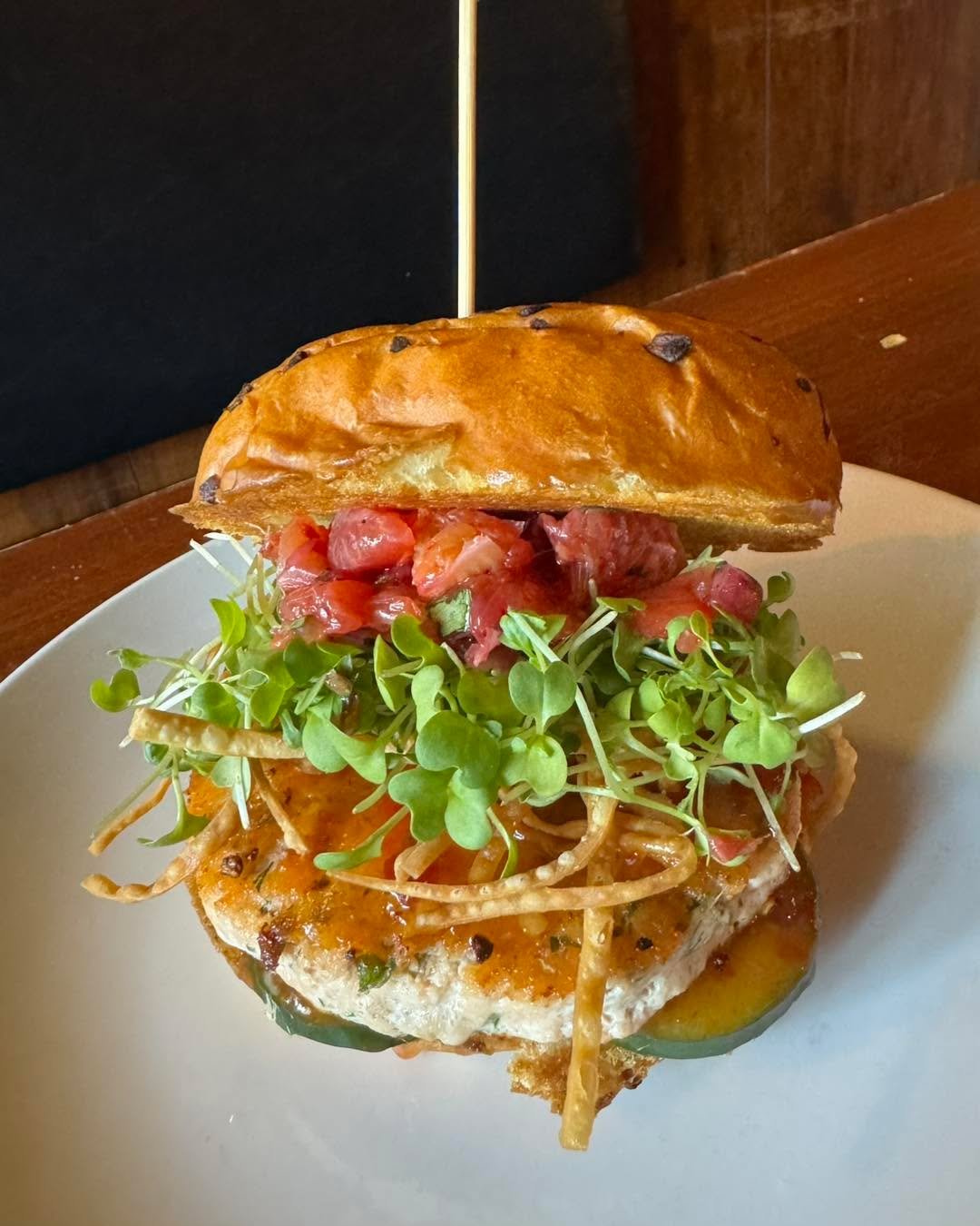 New special alert ‼️
We&rsquo;re rockin the Salmon Burger this week 😋 housemade salmon patty, cucumber slices, sweet chile sauce, fried wonton strips, micro wasabi, blood orange salad on an onion bun. $17.50 available 2/25-3/3

Our Wing flavor today