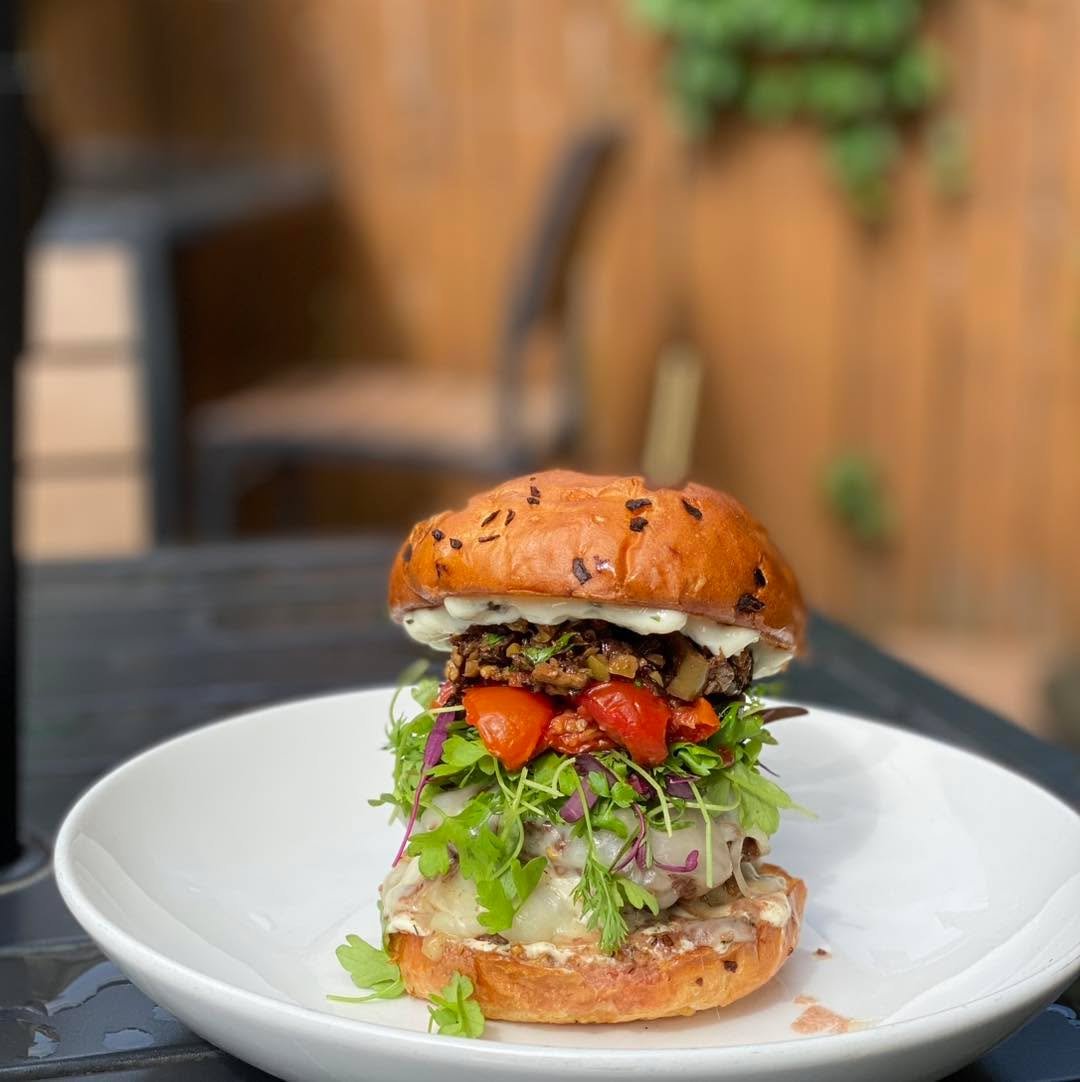 New week, new special! 
Uncle Jim&rsquo;s Olive Burger 😋 Angus patties, smoked provolone, mirepoix micro greens, roasted tomatoes, olive tapenade, fresh herb aioli, on a toasted onion bun. $18.50
Our Wing flavor today is Lemon Pepper served with chi
