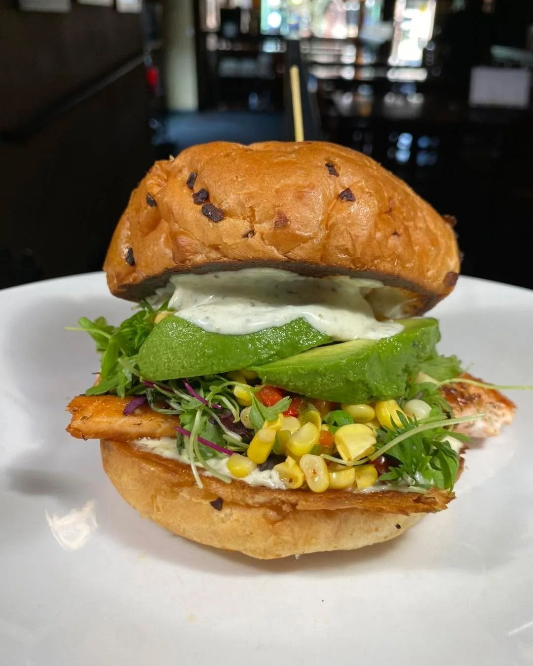 New special this week - Summer Salmon Sandwich 😋
Seared salmon fillet, cumin lime aioli, microgreens, roasted corn relish, and avocado on a toasted onion bun
$17.50

Our Wing flavor today is a strawberry chipotle rhubarb glaze, served with a side of