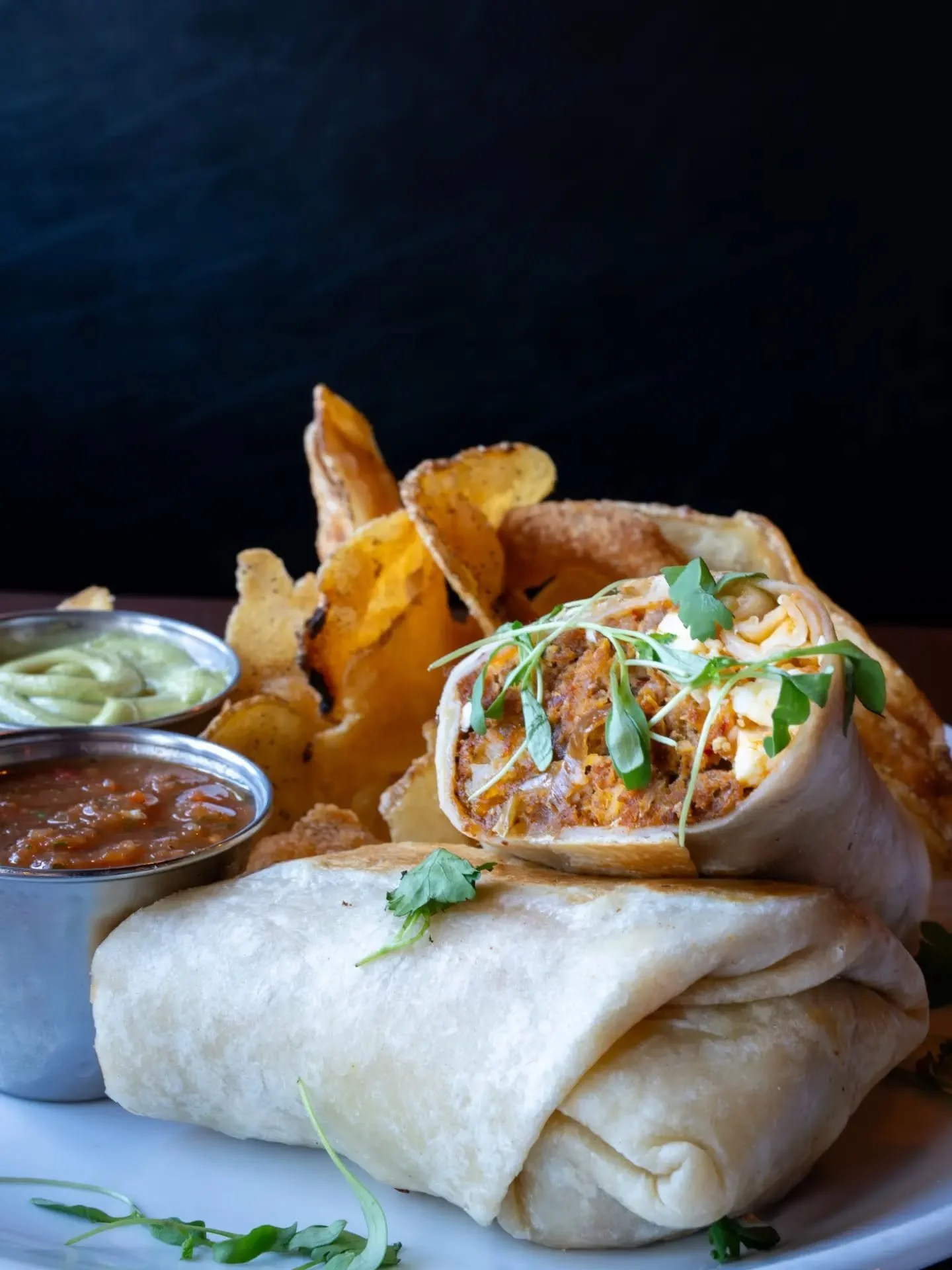 Breakfast just got wrapped up. 🌯

Chorizo, scrambled eggs, seasoned hash browns, caramelized onions, cotija, cilantro, avocado cream, and house salsa, all wrapped in a flour tortilla.

Brunch Saturdays &amp; Sundays from 11&ndash;2. See you at the P