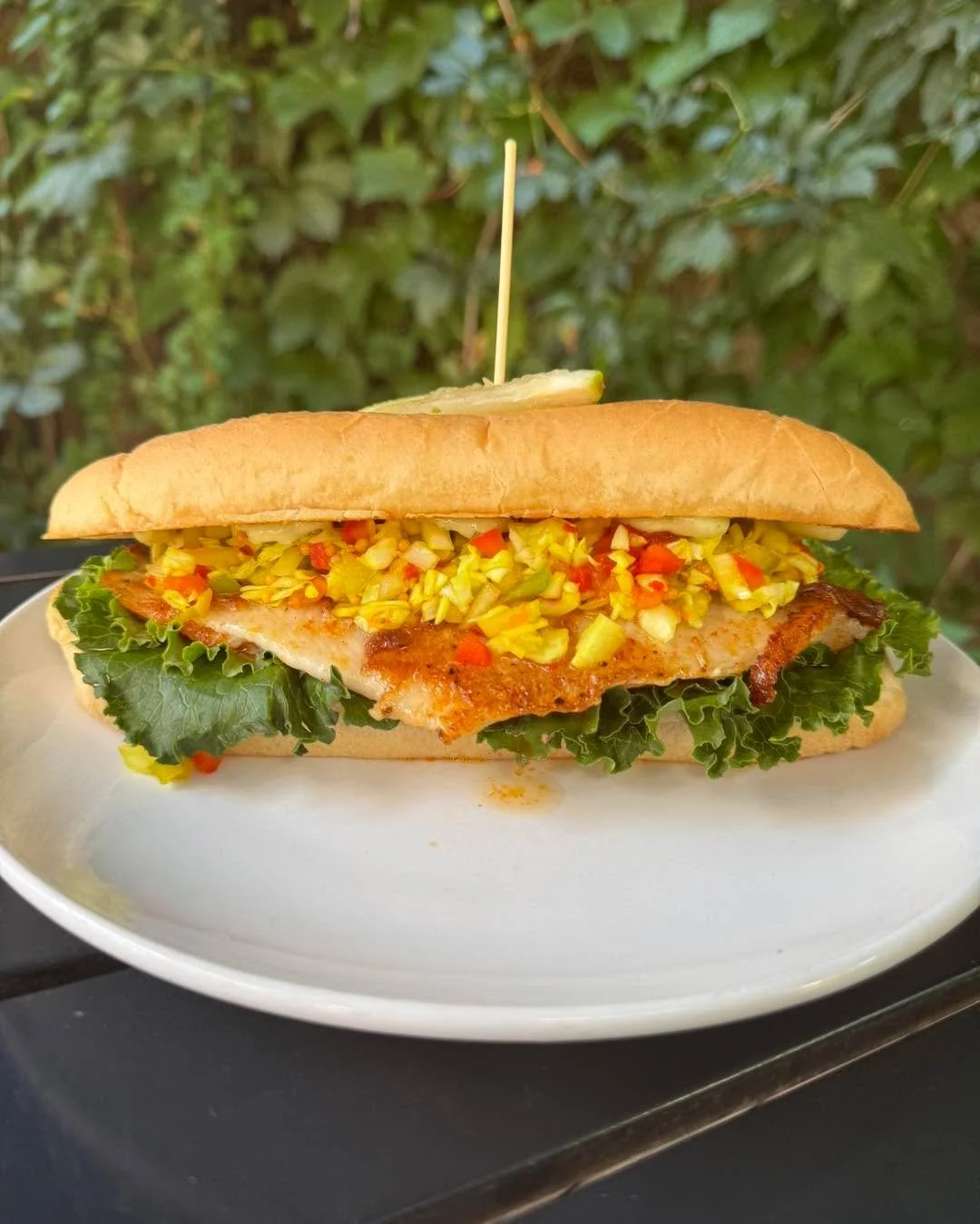 Blackened Catfish Sandwich is our feature this week 🤤 Blackened catfish, lime dill aioli, lettuce, and chow chow relish on a hoagie. $20 available 8/5-8/11

Our Winf flavor today is a smoked paprika and peach. Available while supplies last. 🍑