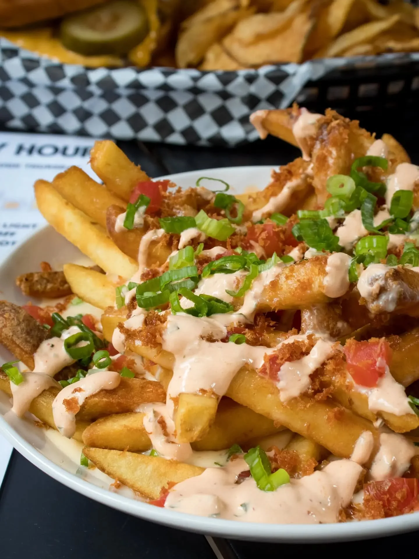 A little sunshine, a spot on the patio, and a big ol' plate of Loaded Fries. Not a bad way to spend a beautiful fall afternoon. 🍂

Seasoned fries piled with cheese sauce, bacon, tomato, green onion, and chipotle sour cream. Even better? They're avai