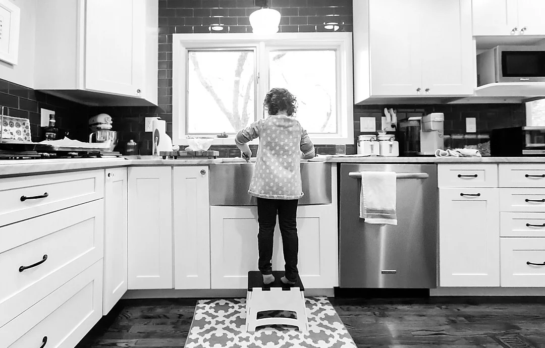 Child in front of window.JPG
