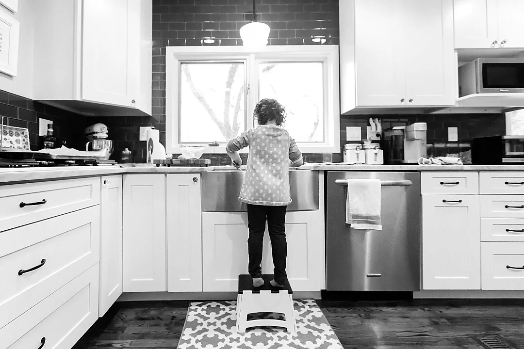 Child in front of window.JPG