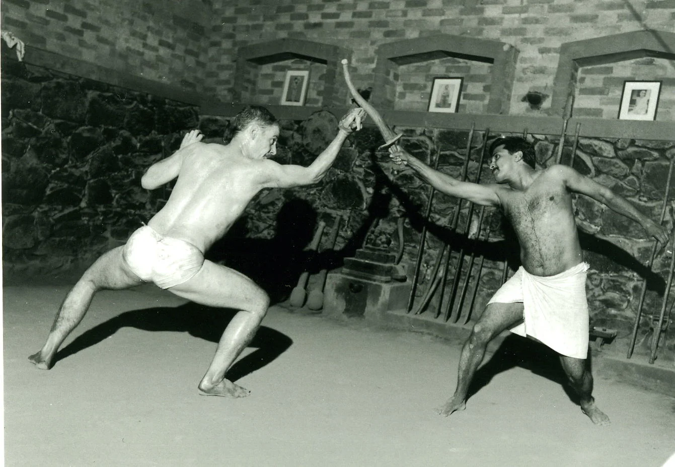 Zarrilli practicing advanced otta with Rajashekharan Nair at the CVN Kalari, Thiruvananthapuram, Kerala, India. Zarrilli trained with his primary teacher, Gurukkal Govindankutty Nair, for seven years in Kerala.