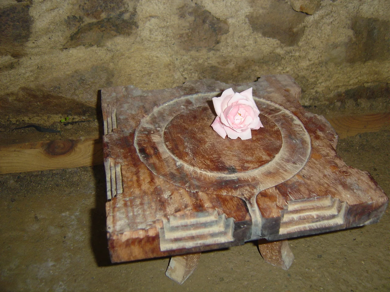 The pitham (stool) where the lineage of teachers 'sit' to observe the training.