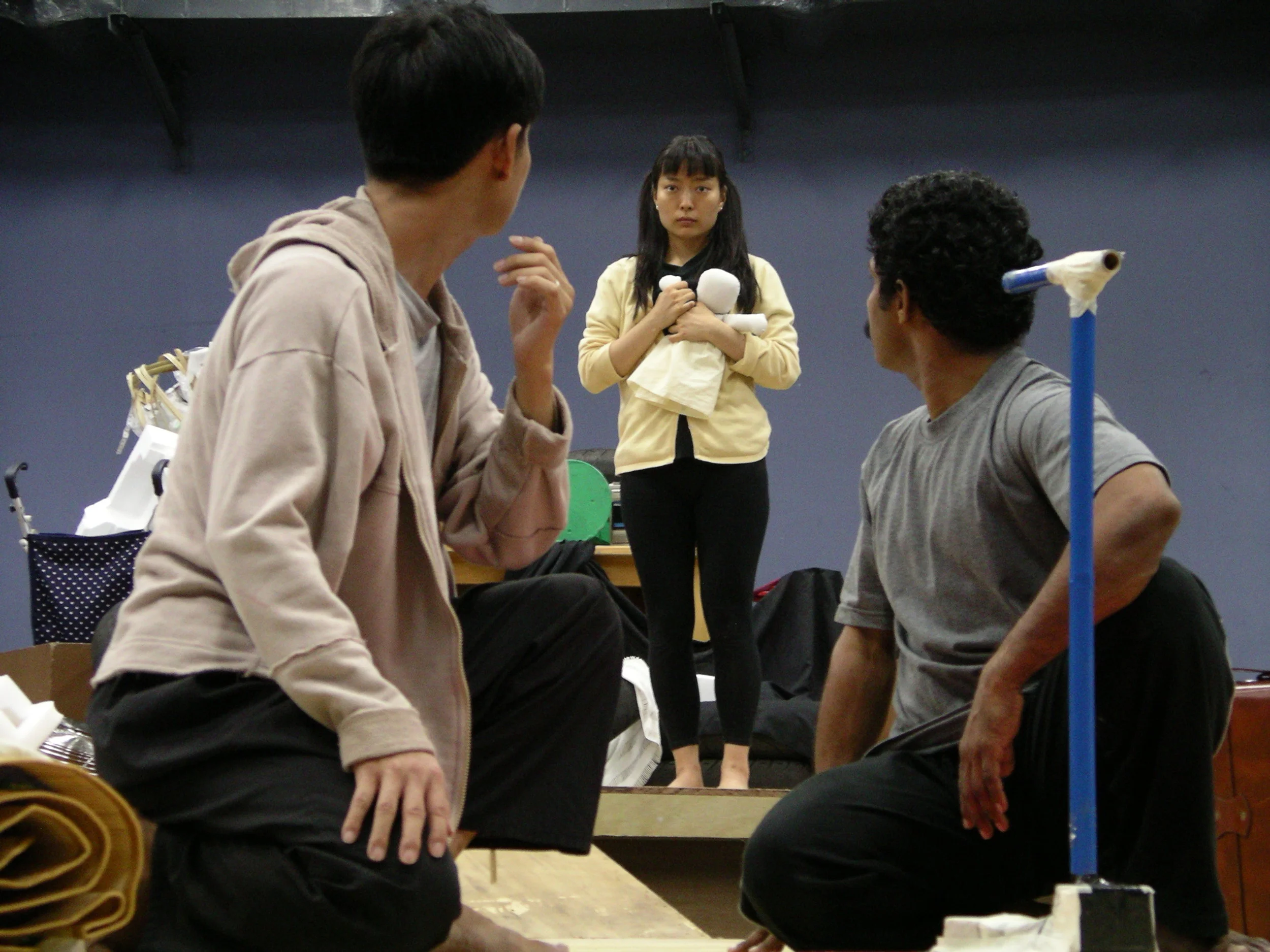 The encounter between Man 1 and Man 2 and The Girl (Jeungsook Yoo), during TTRP rehearsals of The Water Station in 2004.