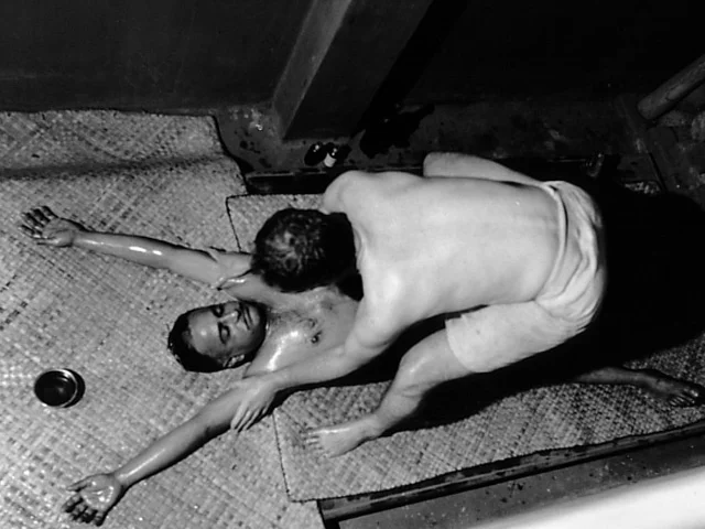 Phillip Zarrilli giving the traditional full body massage at the CVN Kalari, Thiruvananthapuram.