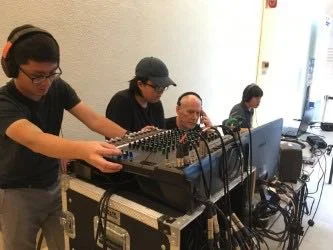 Directing the three camera live-streamed performance from the hallway outside the Gallery Theatre.