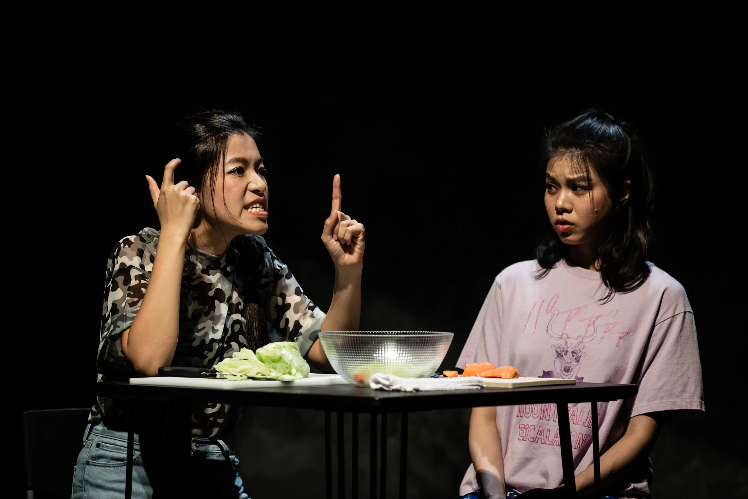 Scene 2: Regina Foo and Theresa Wee-Henko. Photo by Bernie Ng.