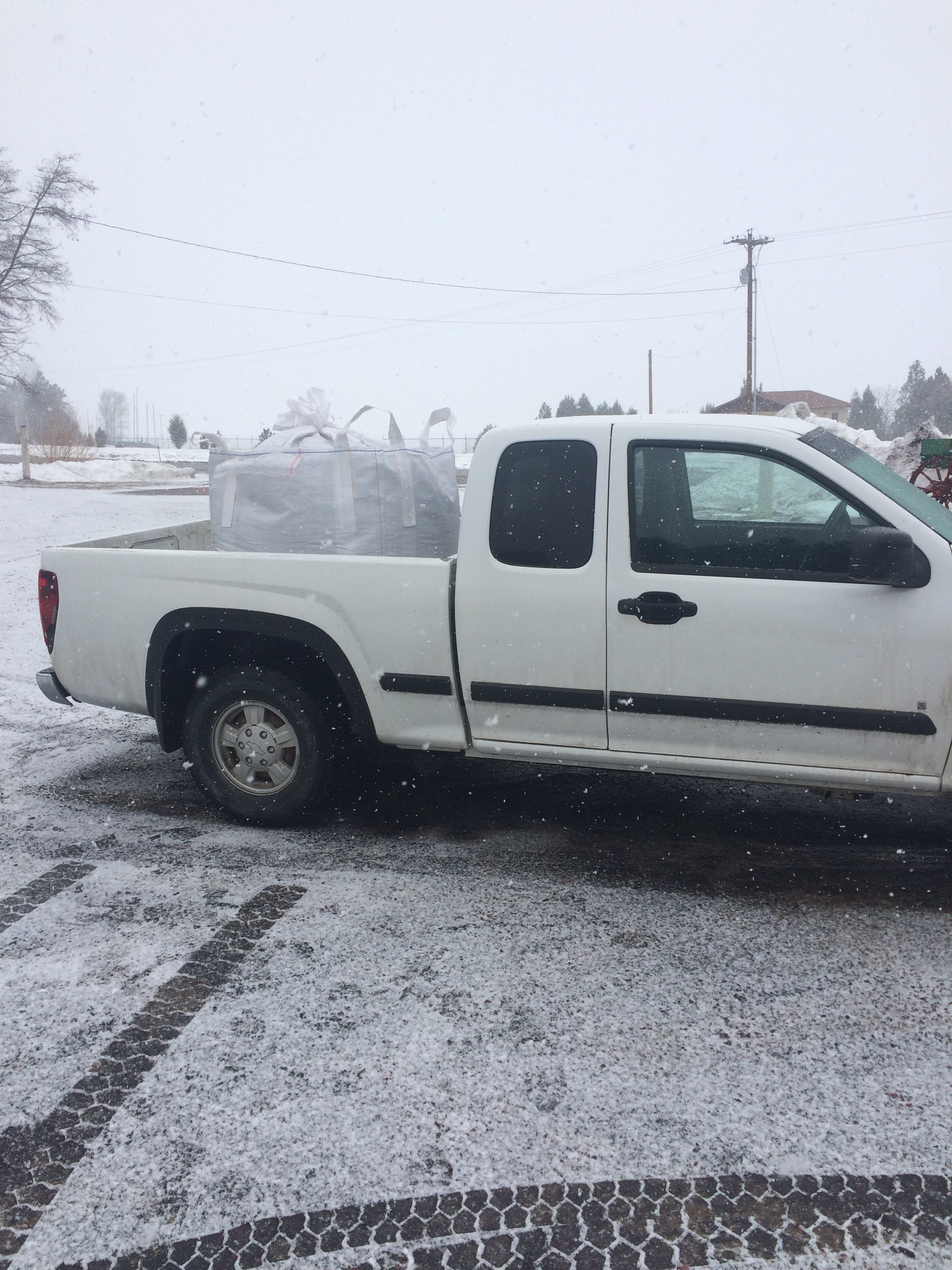 Nathan's truck loaded down today from a trip to get a BIG BAG of potting mix from Peaco Peat Moss & Soils in Big Arm, MT. The company supplies potting mix for organic growers and we are excited to get started with seeding our onions this week with great potting mix!