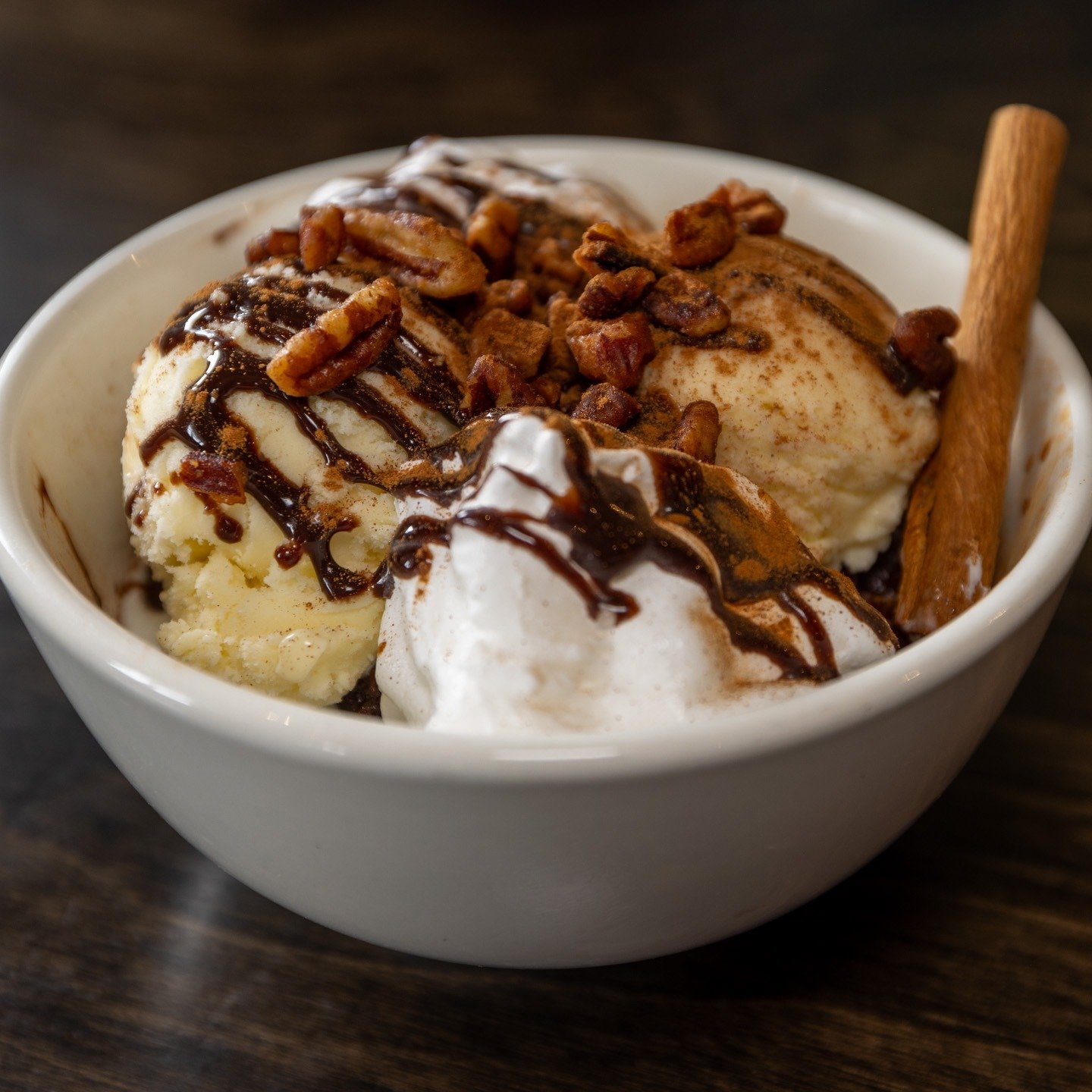 Save room for dessert! Our Chocolate Bread Pudding comes with chocolate chip bread pudding, vanilla ice cream, whipped cream, chocolate sauce, candied pecans, and cinnamon. #parkcityrestaurants #parkcityfoodie