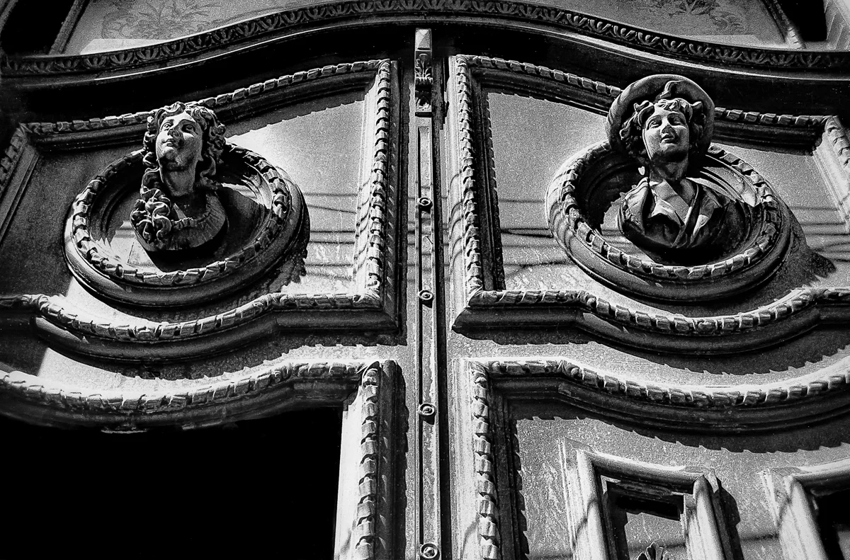 Sculpted Busts on Door, Puebla, Mexico