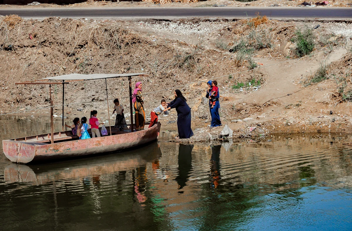 Women, Children and Boat, Cairo, Egypt