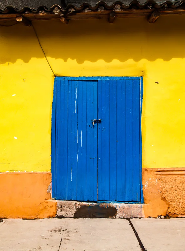 Dark Blue Wood Door, Orange-Yellow Wall, Ollantaytambo, Peru