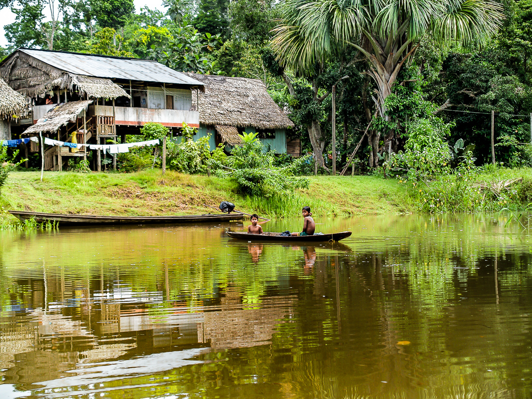 Boys in a Canoe in the Amazon, Peru