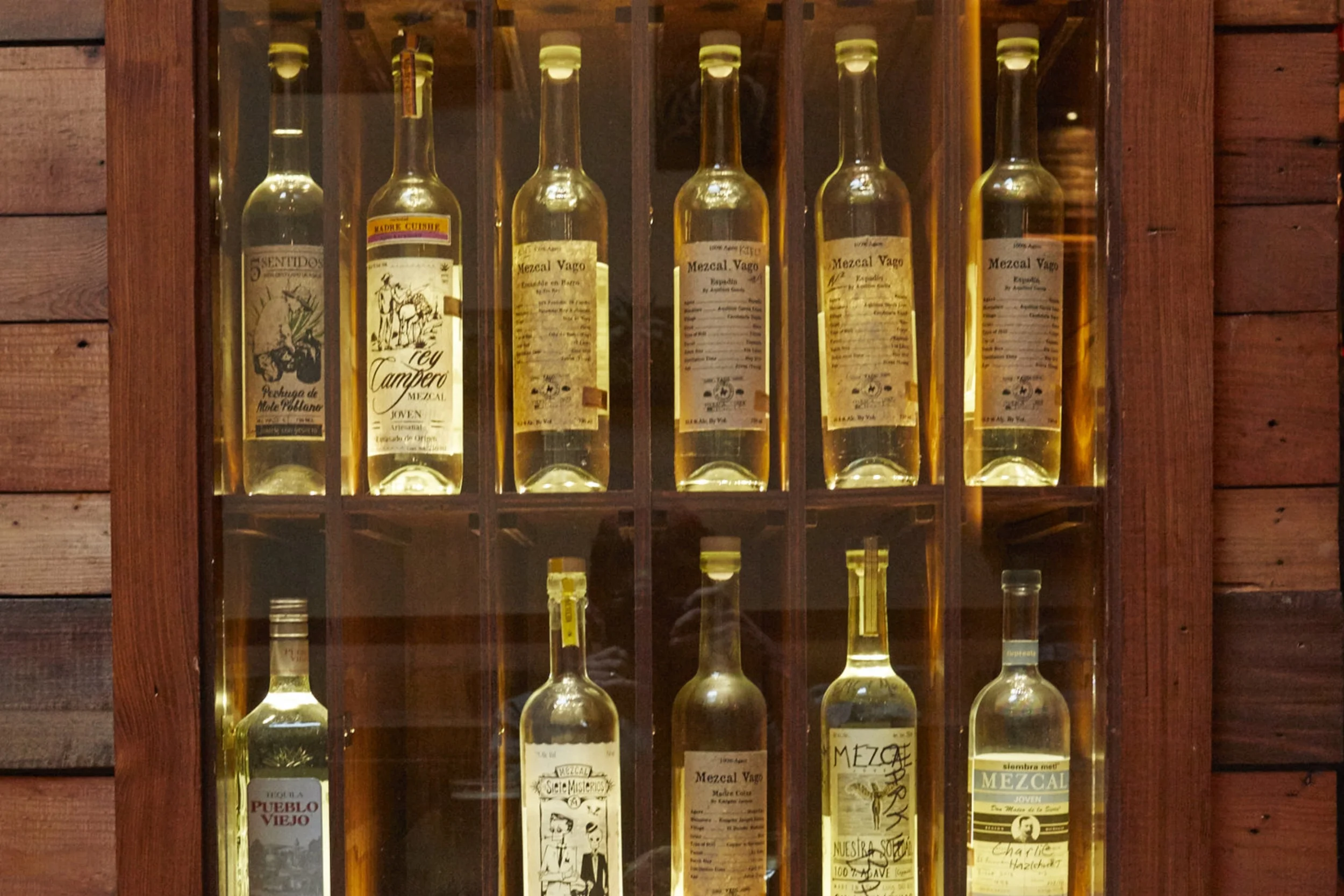 Locker with Mezcal bottles