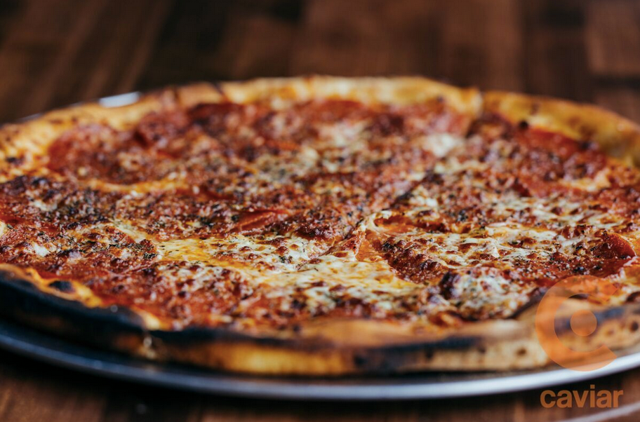 Just can't say no to our pizza! 