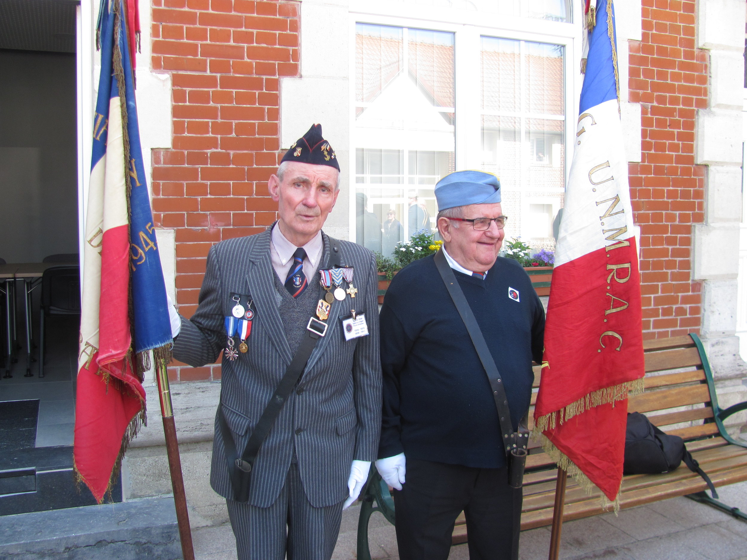 Portes drapeux - flag carriers from Thelus Veterens' Associations participate in the ceremony. 