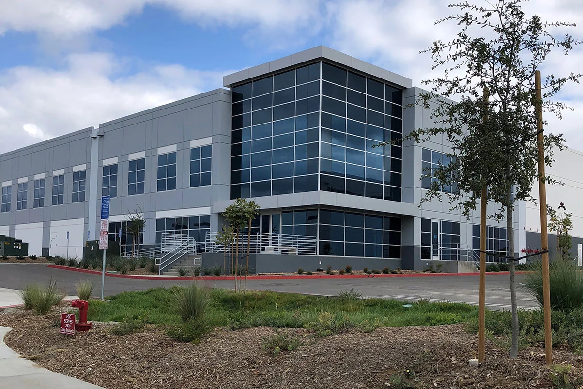 our-work-page-outside-building-of-a-customer-1204x803.jpg