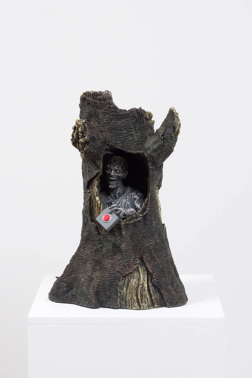 Trigger Finger, 2017 Vinyl figure, plastic weapons, resin tree, pedestal