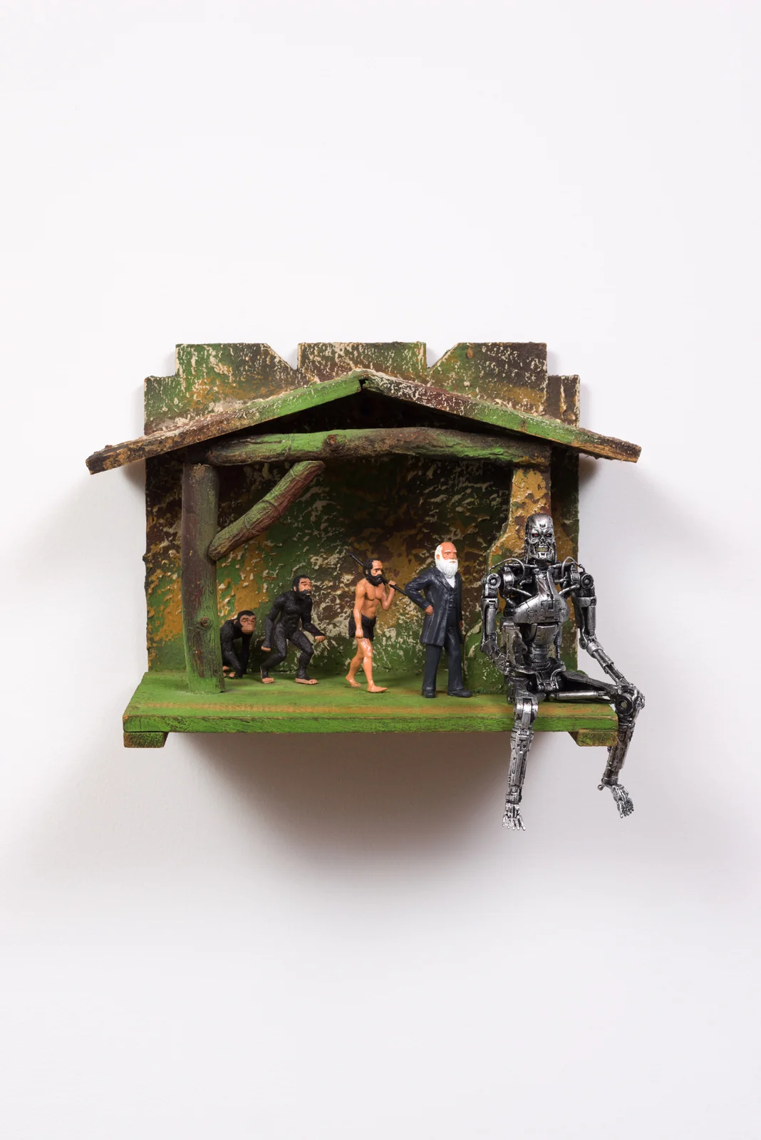 Evolution in a Manger, 2017 Plastic figures, wooden model
