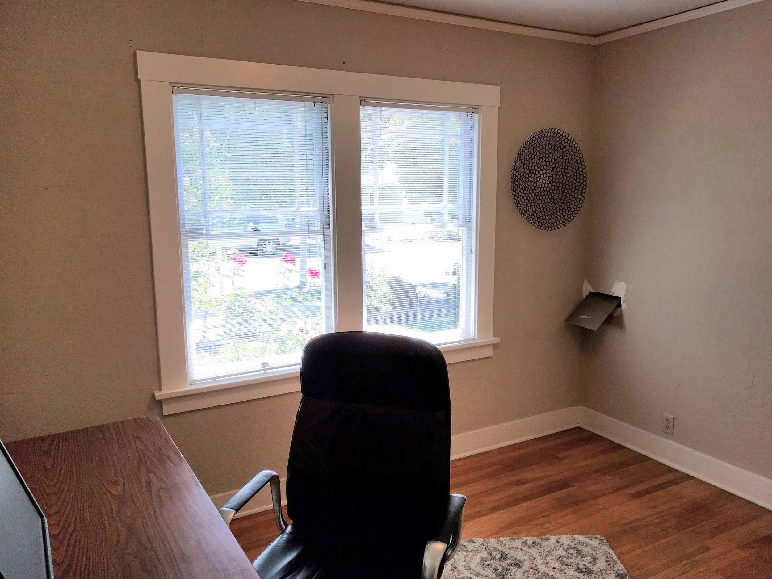 The nursery, before renovations began. It was previously used as a home office.