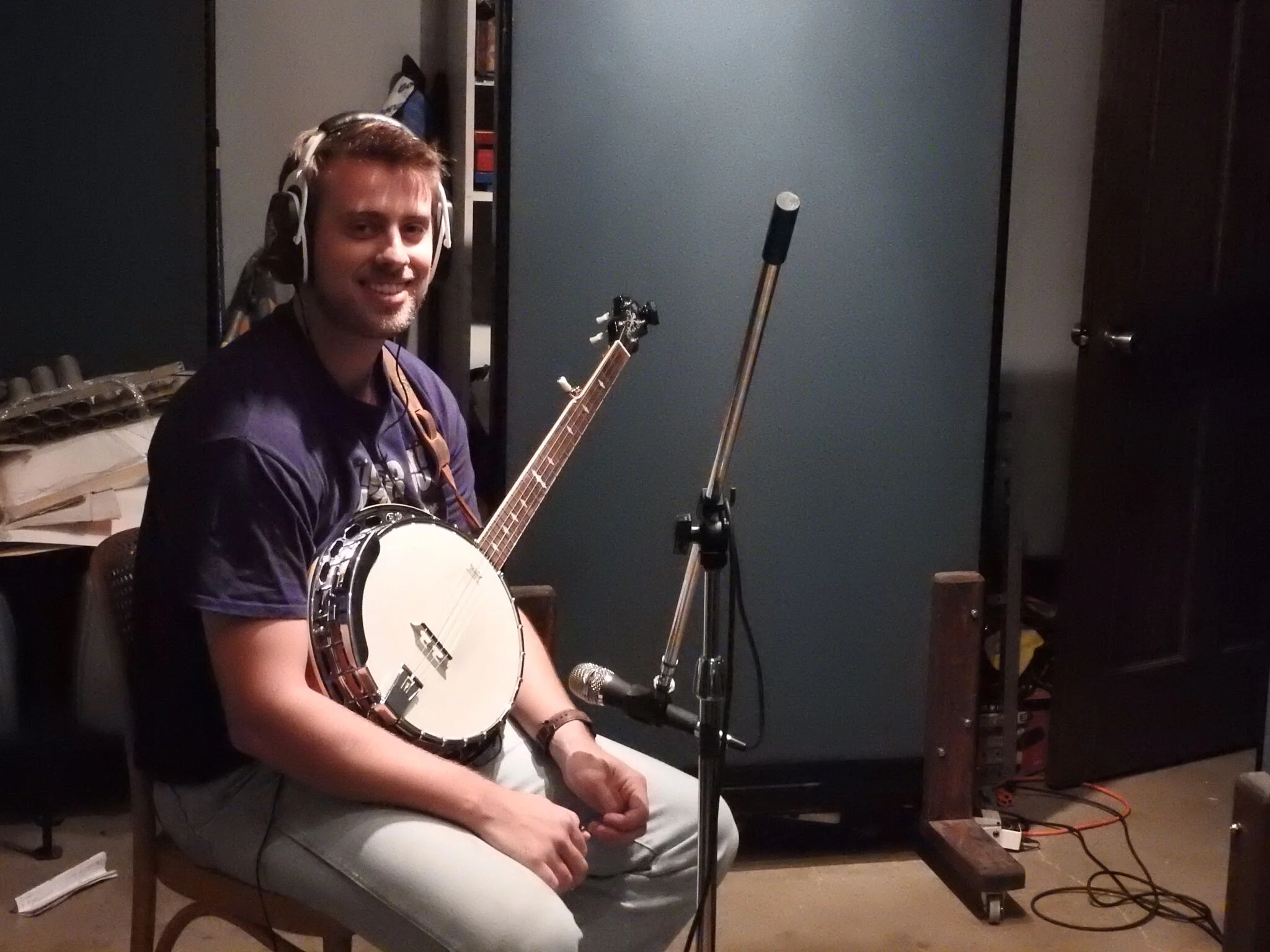 Nick Zizinia, recording with Cougar Roots at Paul Beebe's studio. 