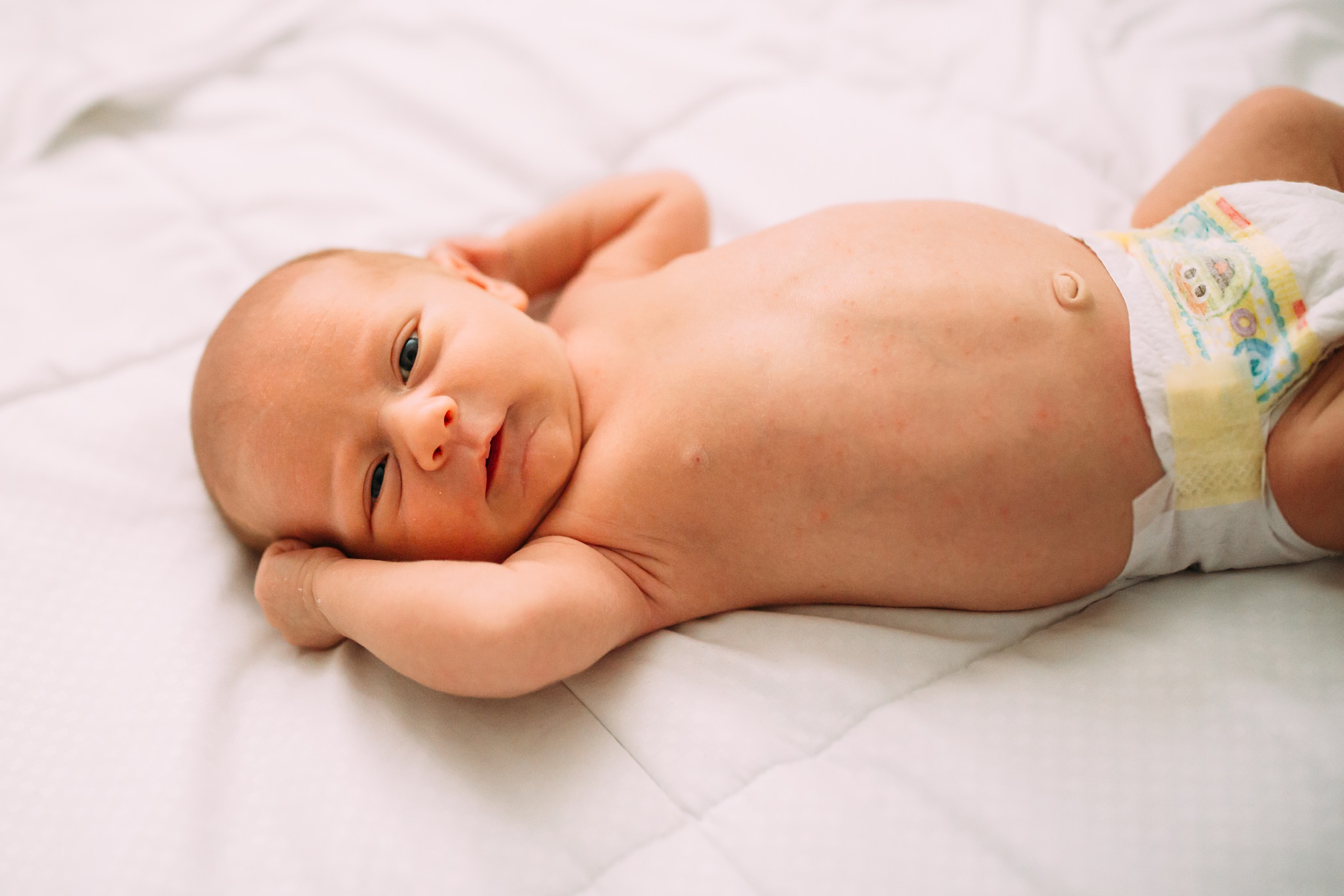 Baby Boy Looks Up At Camera | Whidbey Island Newborn Lifestyle Photographer