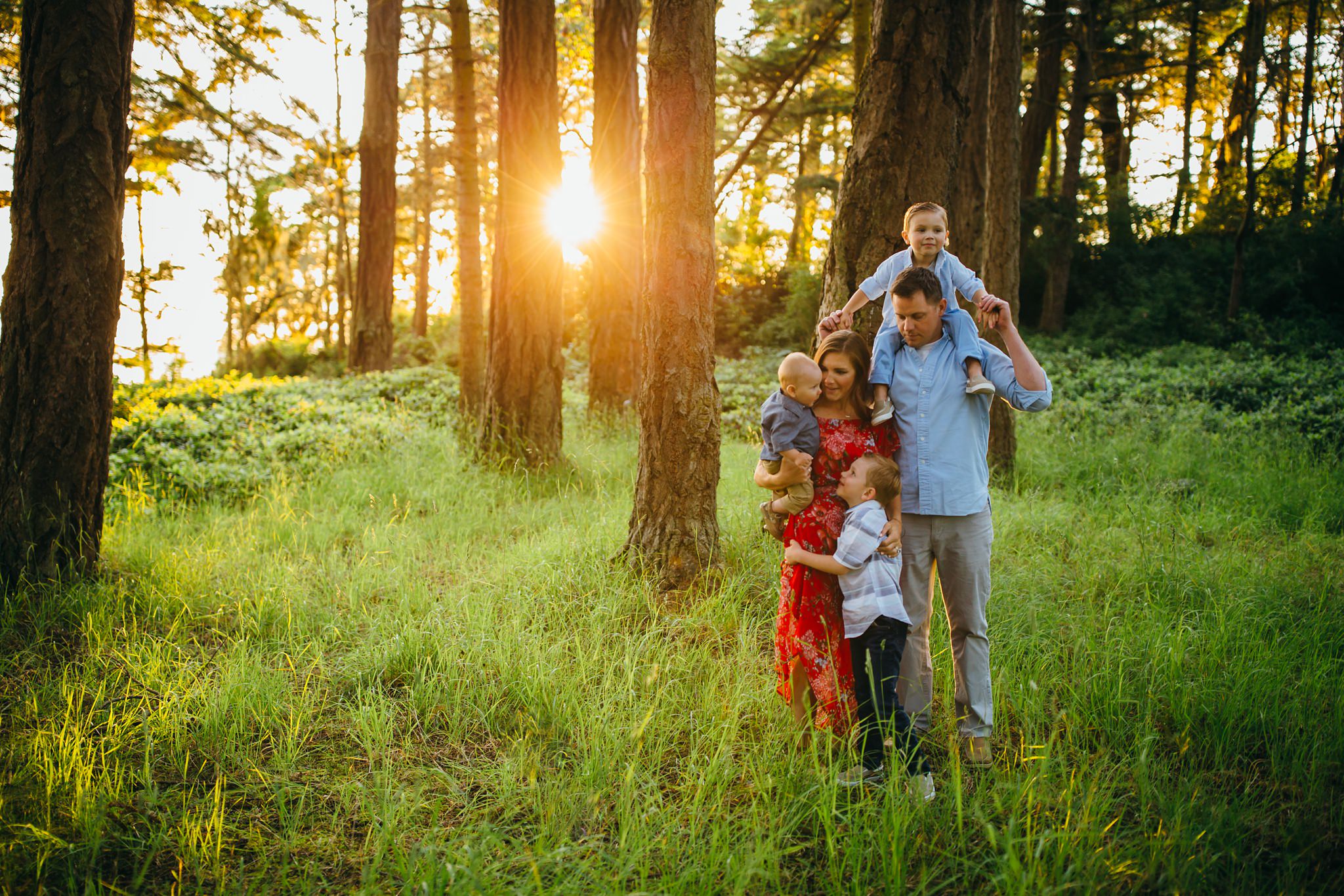 Family hugs in forest at Deception Pass | Whidbey Island Family Photographer