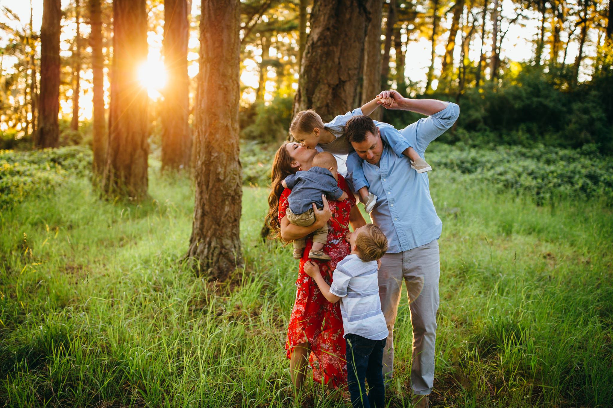 Family plays in forest | Whidbey Island Family Photographer