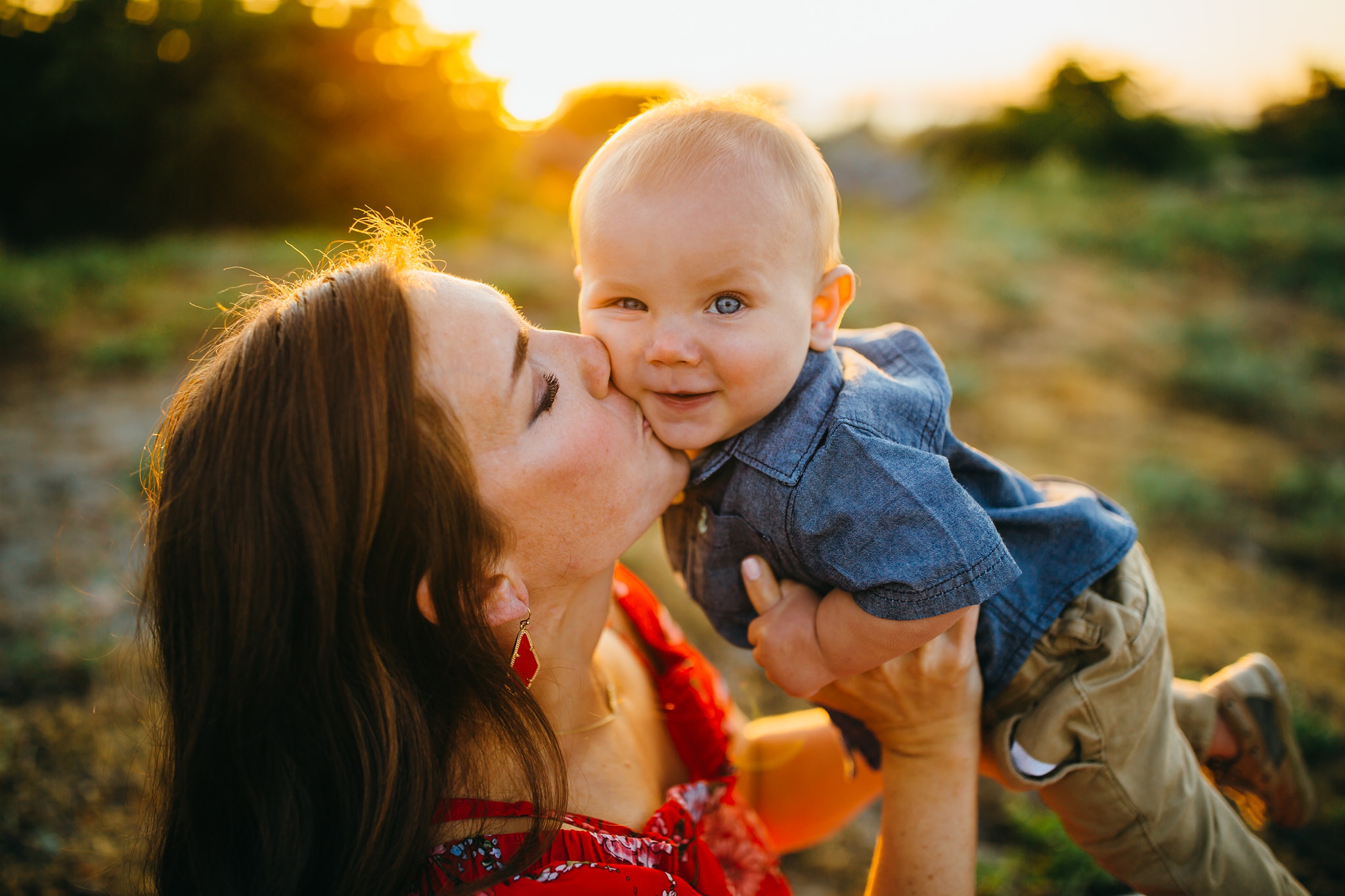 Mom kisses baby on cheek | Whidbey Island Family Photographer