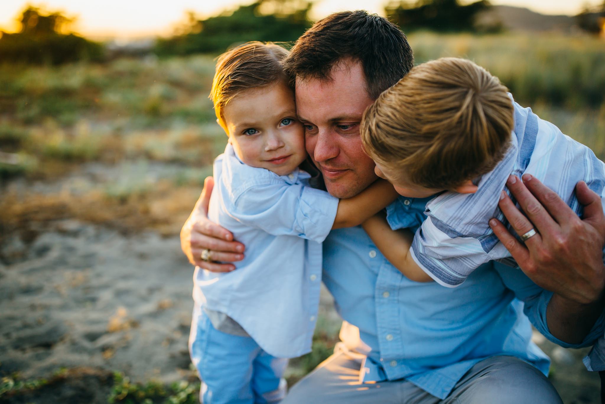 Father hugs sons | Whidbey Island Family Photographer
