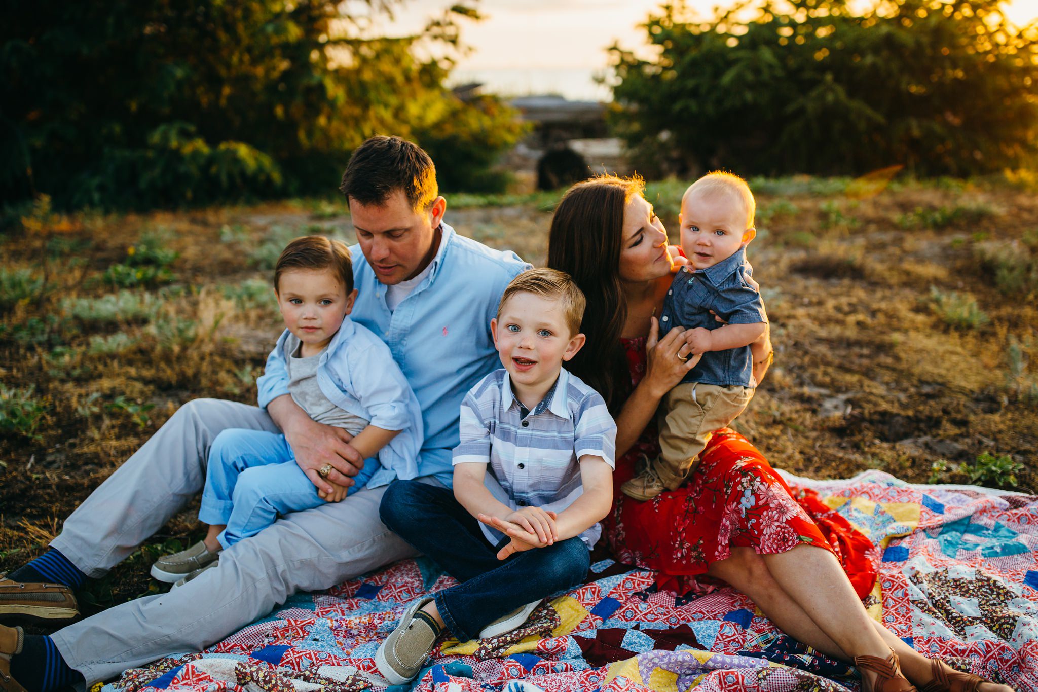 Family sings song on beach | Oak Harbor Family Photographer