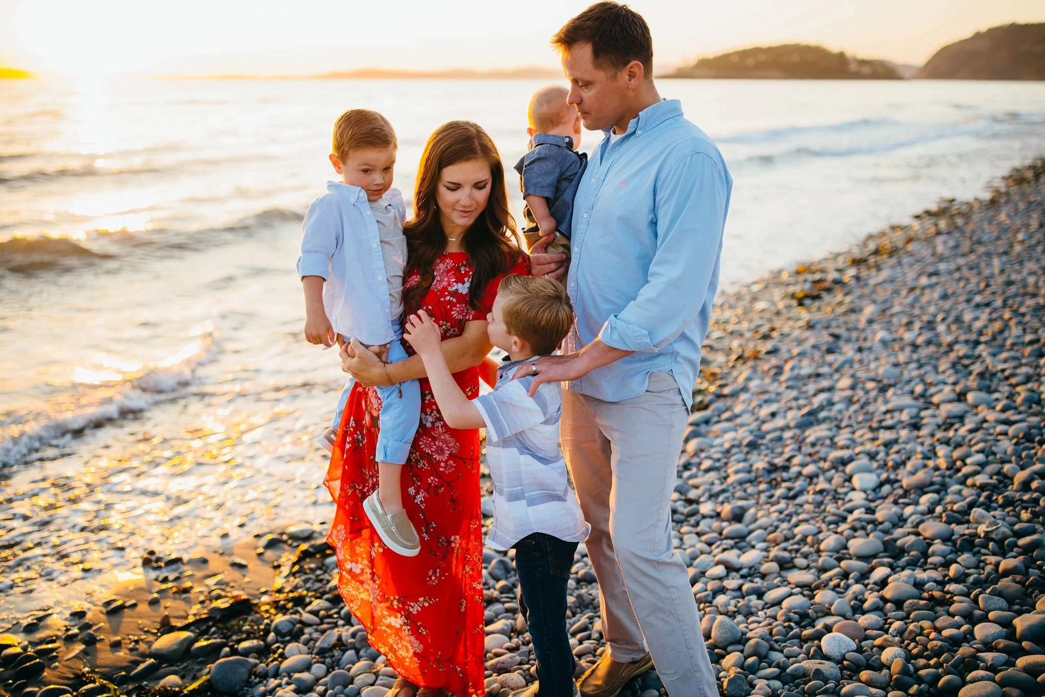 Family walks along beach at sunset | Oak Harbor Family Photographer