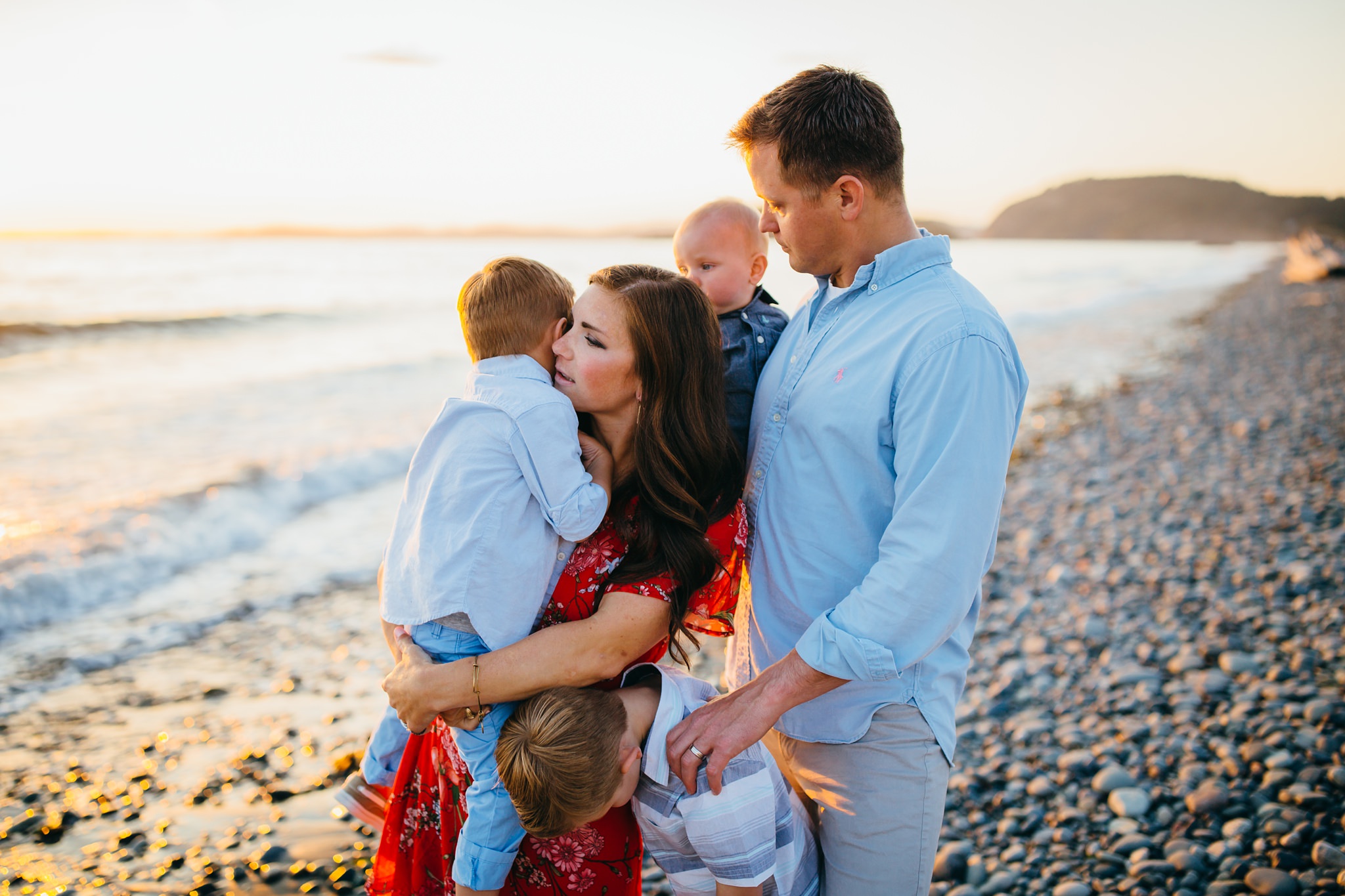 Family hugs on beach | Oak Harbor Family Photographer