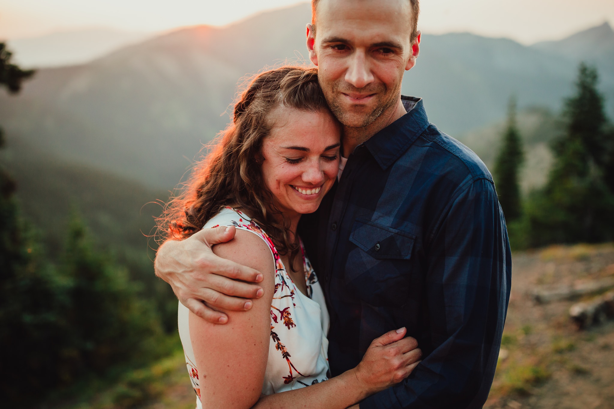 couple embraces at hurricane ridge