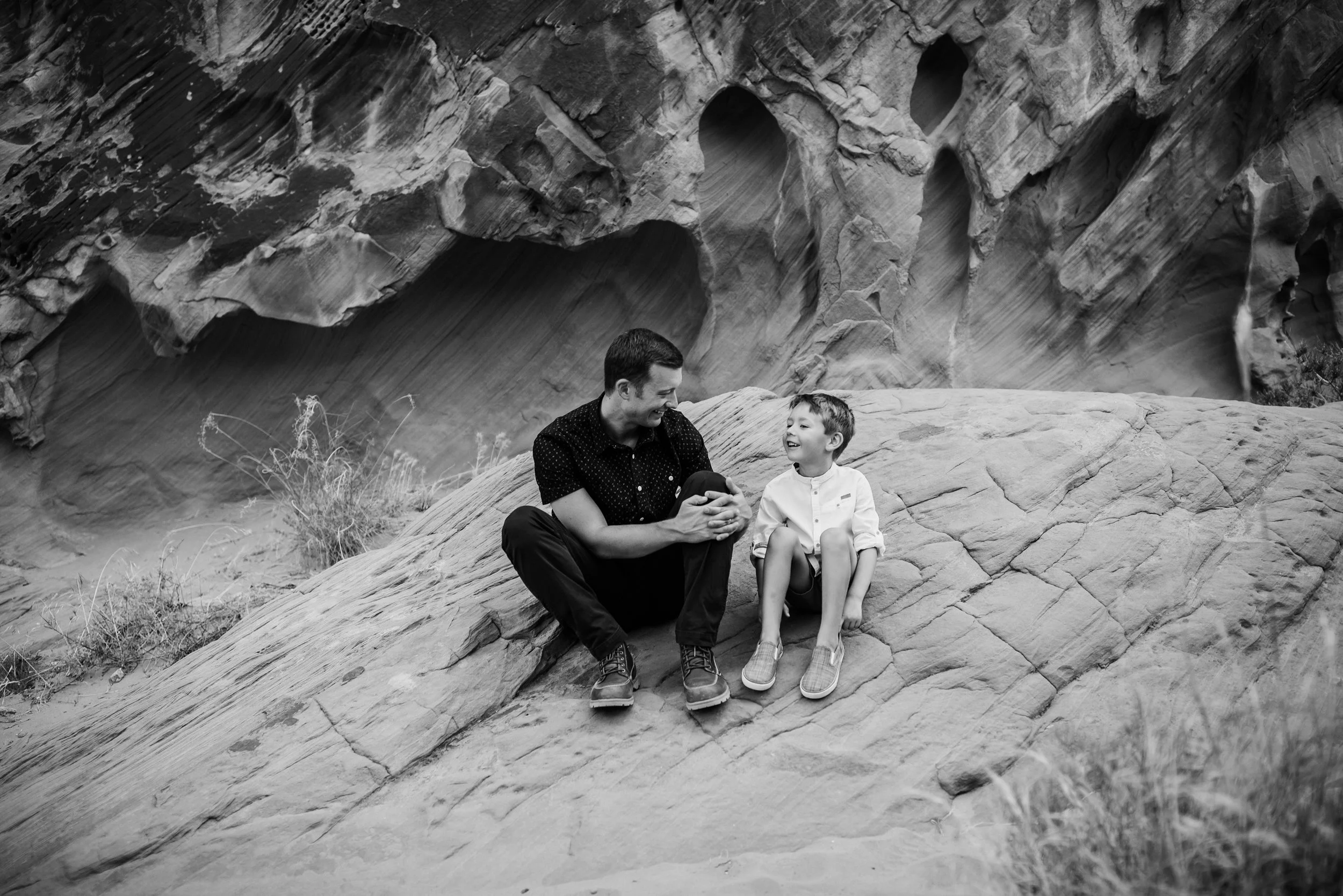 father and son talk during valley of fire photo session