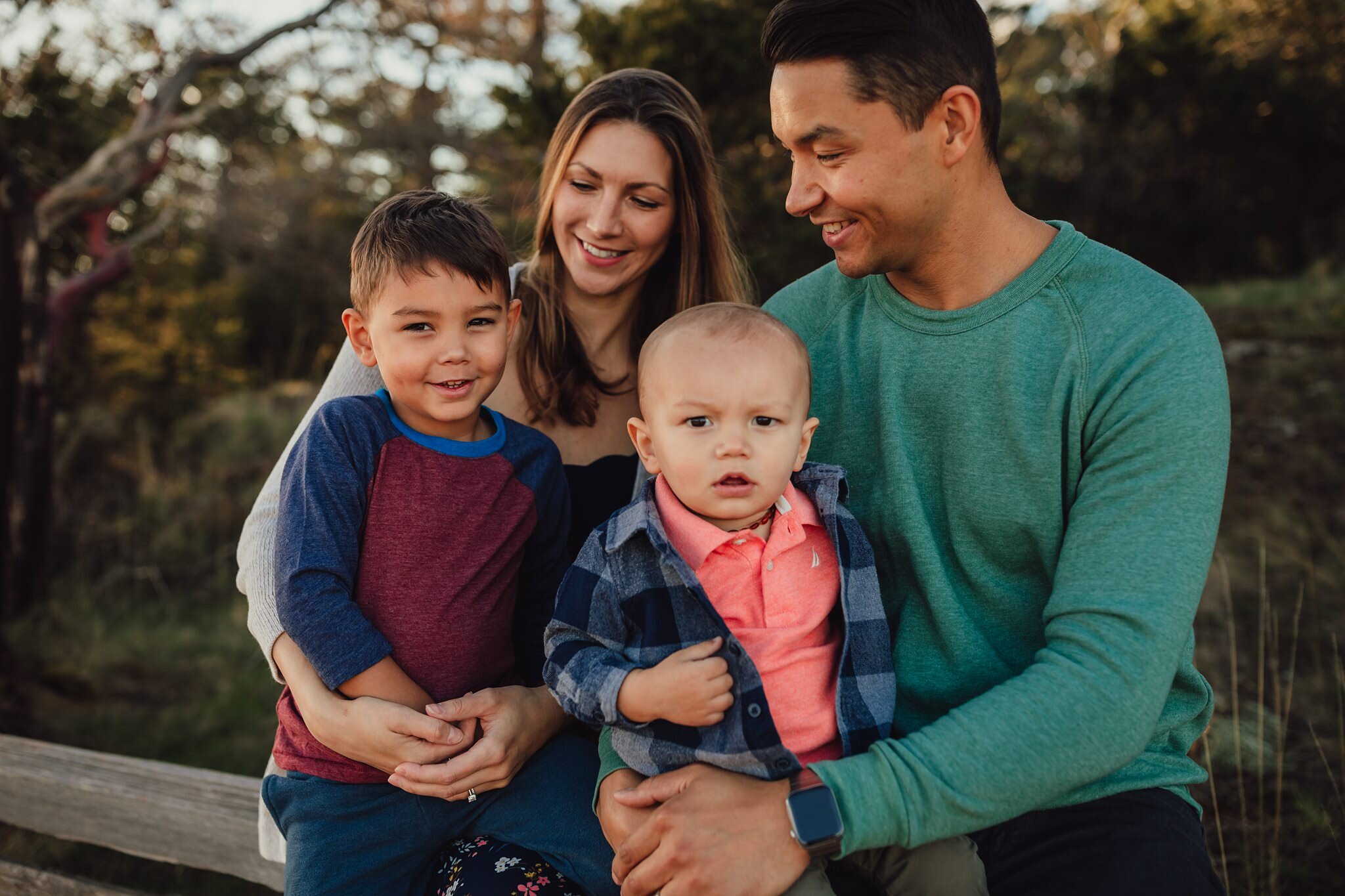 family of four snuggles in Anacortes