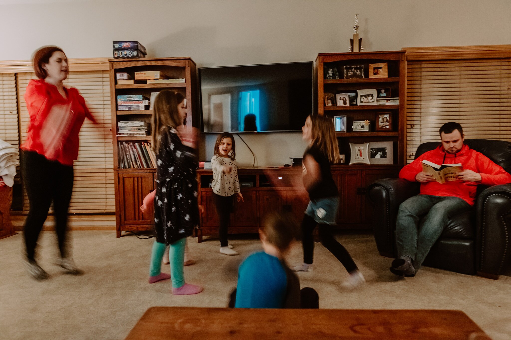 family dances in basement