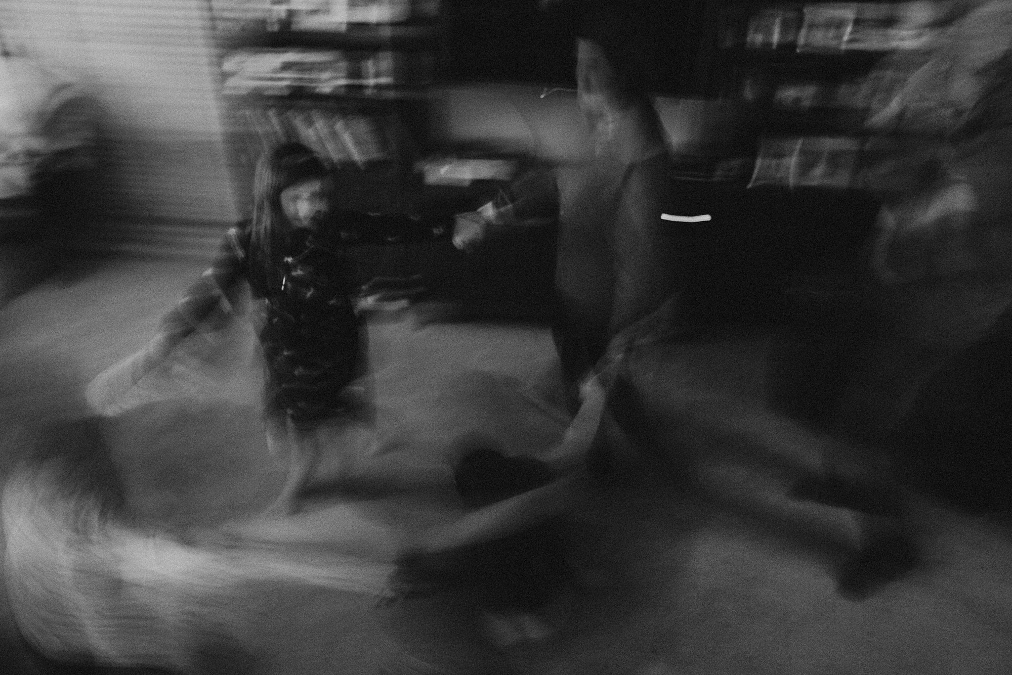 abstract image of kids dancing in low light