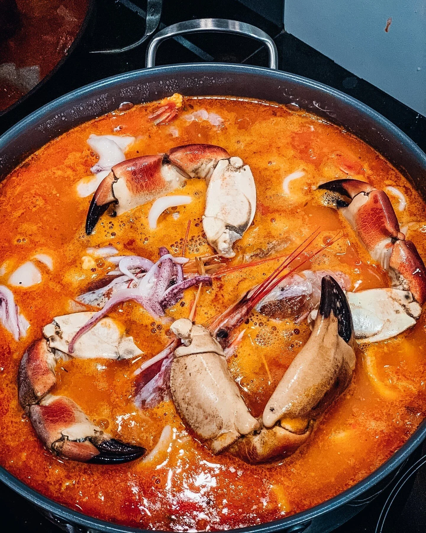 Our chef Dax's absolute favourite dish is Zarzuela, a Spanish fish stew made with white fish, saffron, almonds and tomatoes. ⁠
⁠
Here we made our own version and added a lot of seafood and shellfish to the mix. Fingerlicking good!⁠
⁠
#chefandchief #z