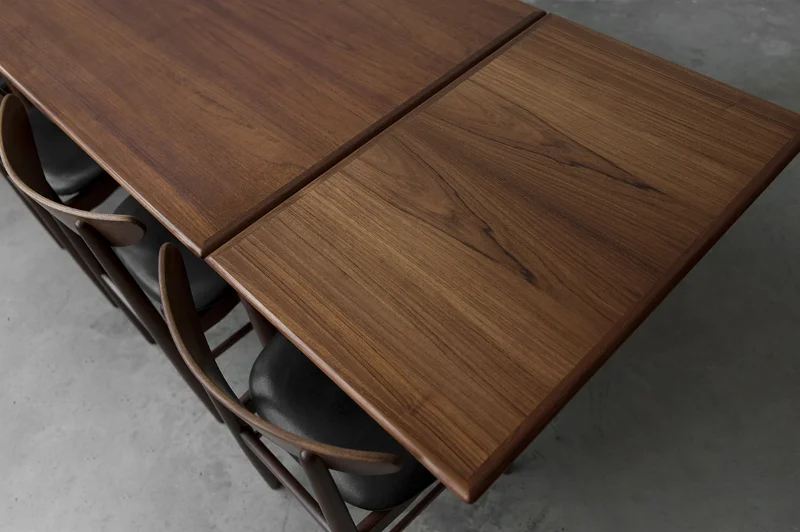 Vintage 1960's Danish teak dining table with extension plates.
