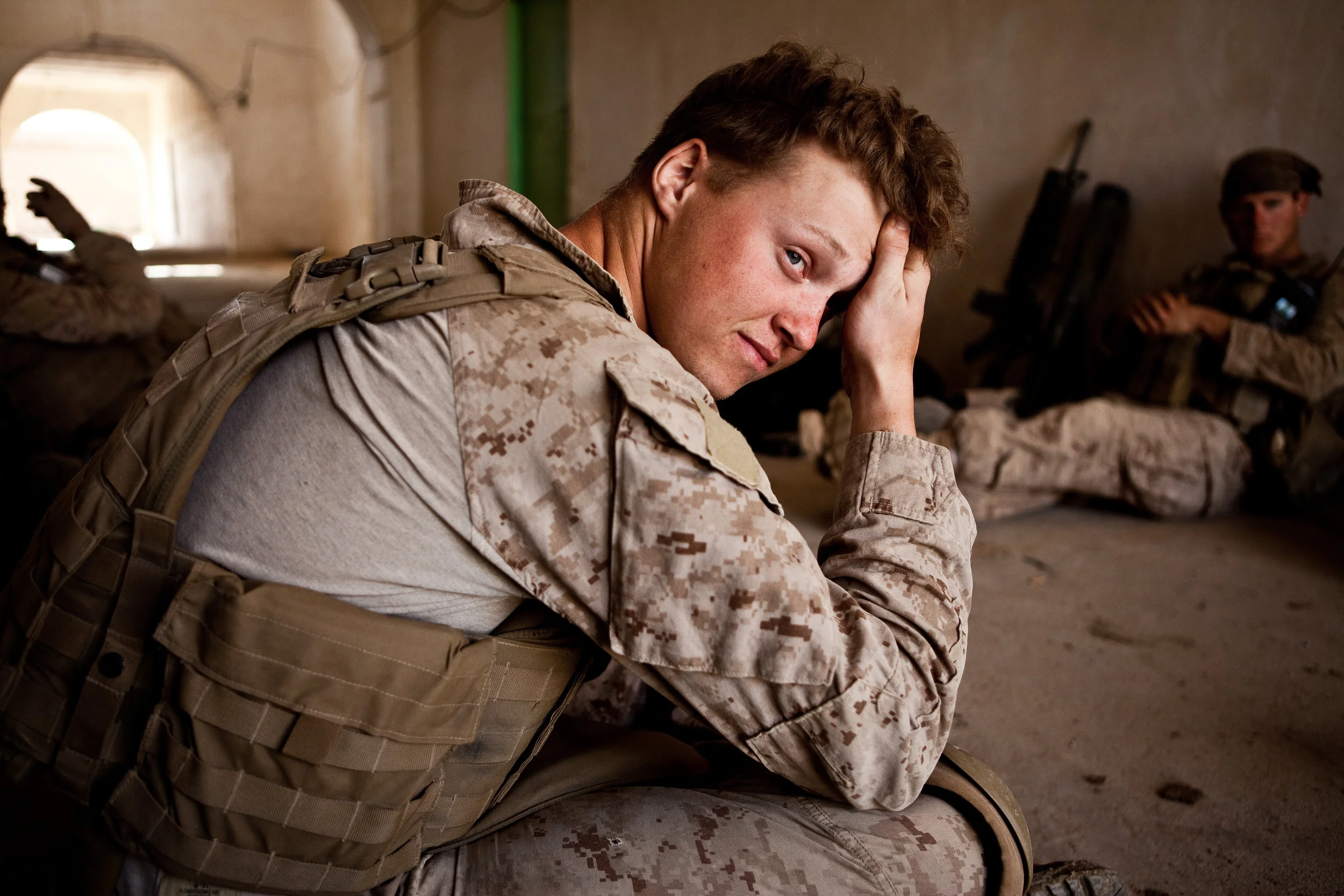  Operation Moshtarek. Marja, Helmand Province, Afghanistan. 2010  Cpl. Andrew Ryan, 26, of C. Co, 1-6 USMC rested between combat patrols as his unit assaulted the Taliban stronghold of Marja, in Helmand Province, during Operation Moshtarek. 