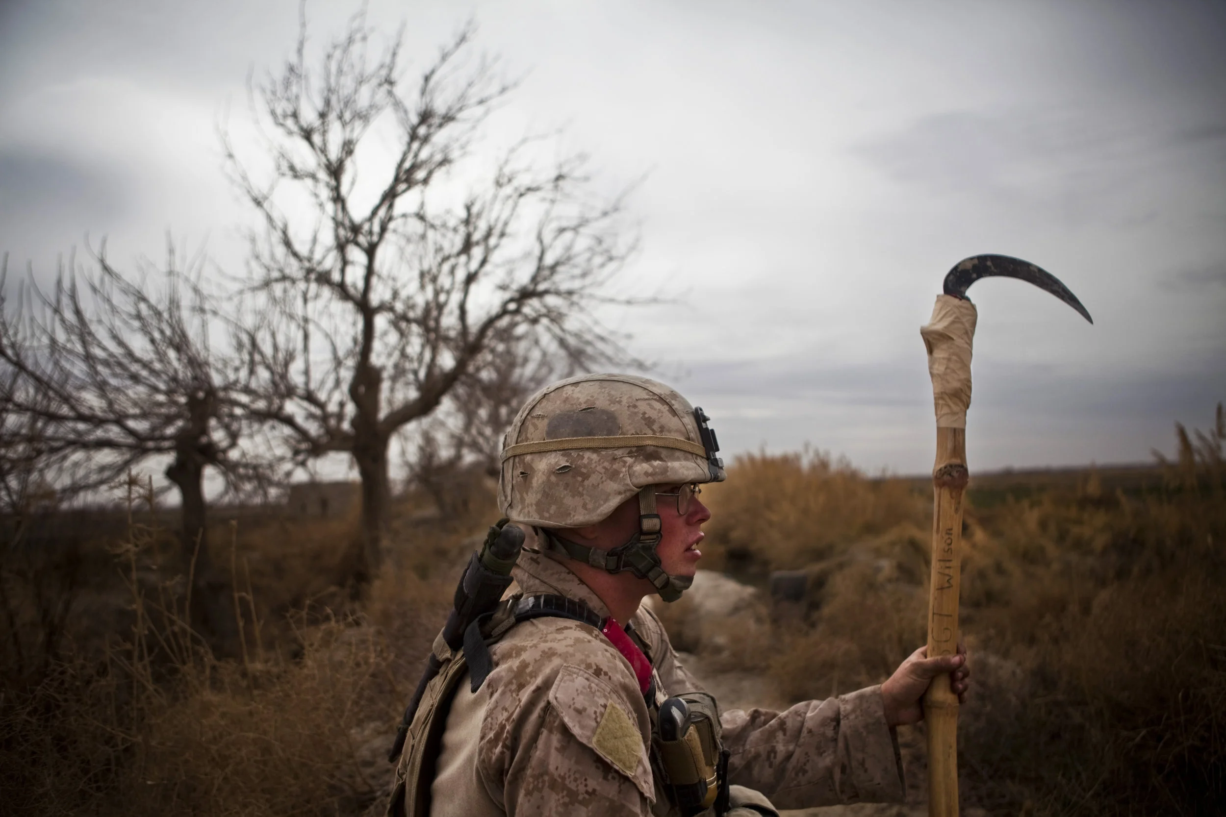  Garmsir District, Helmand Province, Afghanistan. 2011  Crpl Brock Bean of Ainsworth IA, holds a "Holly Stick" used for searching for IED's while on patrol in southern Garmsir, Helmand Province, Afghanistan. Members of 1st Platoon, Echo Co. 2/1 found