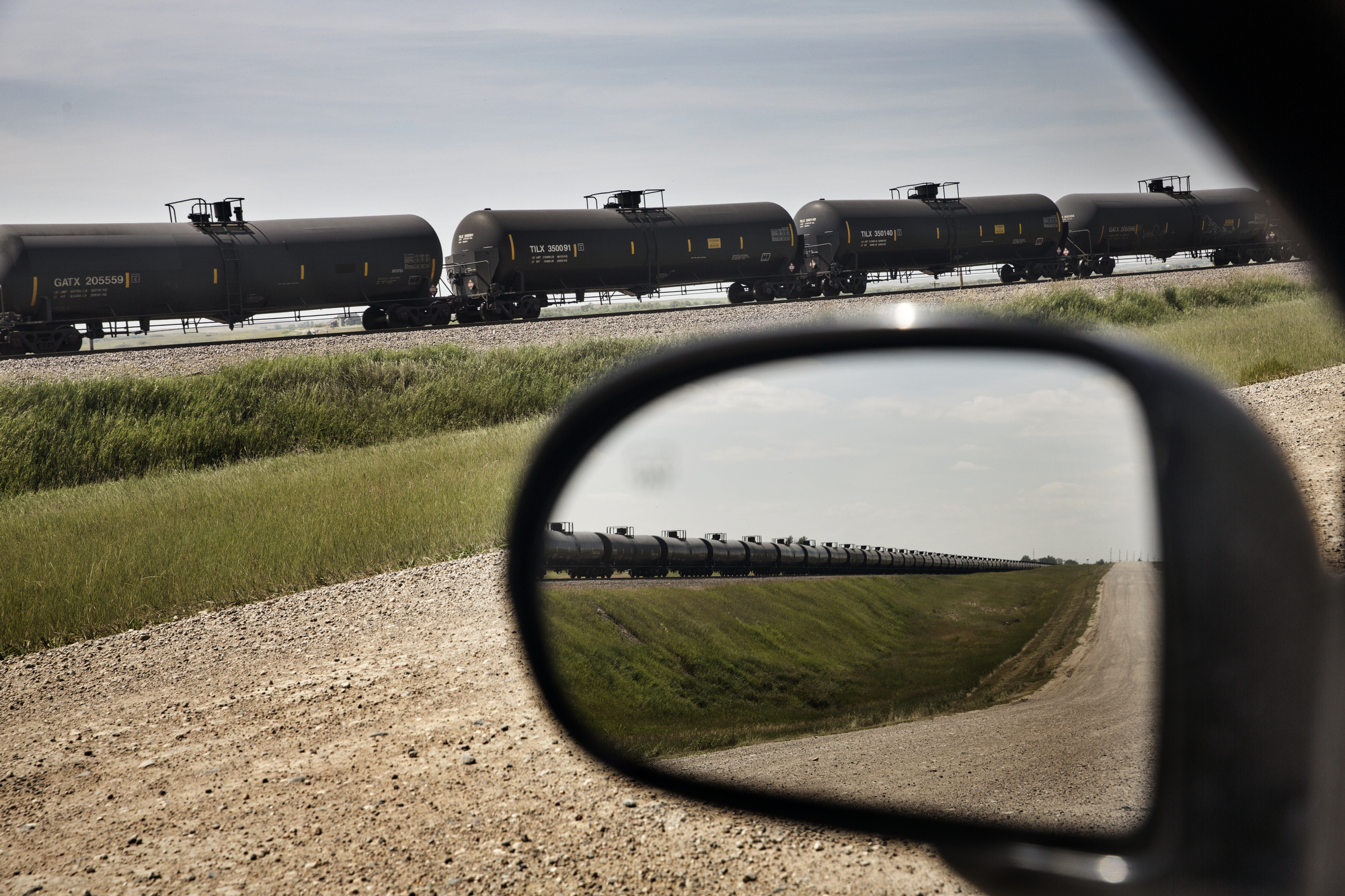  7/16/2014 Epping, North Dakota  Long tanker trains carrying oil east stretch across the North Dakota Prairie outside Epping. Tanker train traffic has crowded out much of the grain and livestock transport capacity that farmers in the region used to r