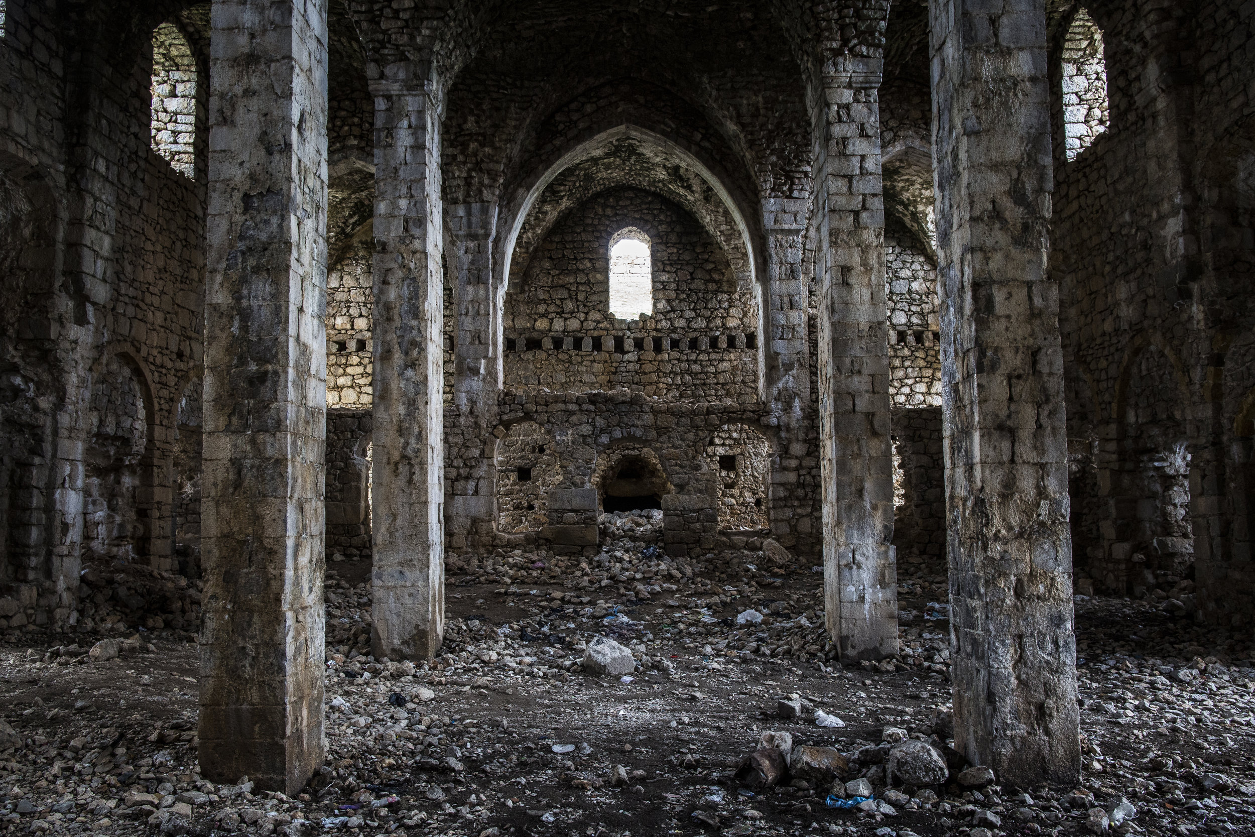  3/18/2015 Çüngüş , Turkey  The gutted and abandoned interior of an Armenian monastery in Çüngüş, Turkey, north of Diyarbakir, which, according to locals, is now used to house livestock.  During the genocide, the local Armenian population of Çüngüş i