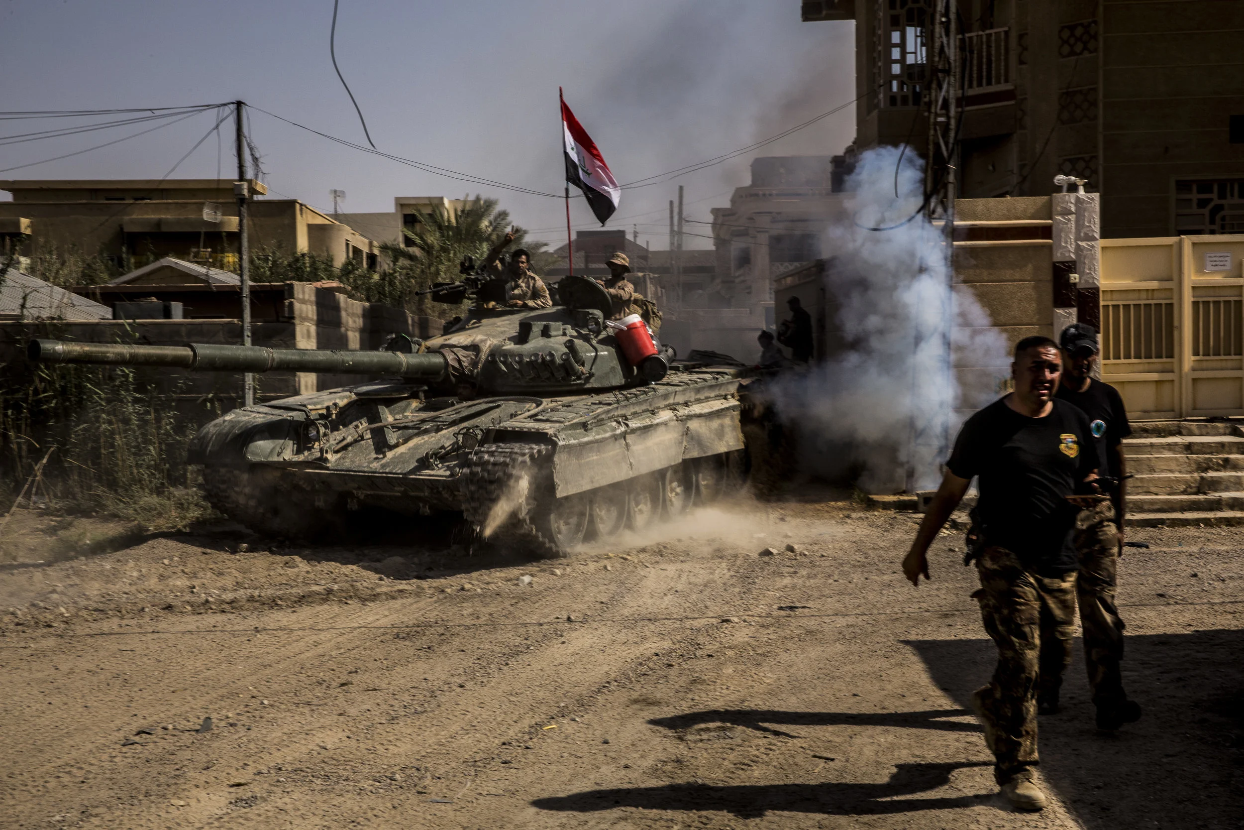  6/25/2016 Fallujah, Iraq  Iraqi Army tanks pushed forward during the final assault on the al-Jolan district of Fallujah, Saturday, as Iraqi Forces fought the last ISIS elements in the city. 