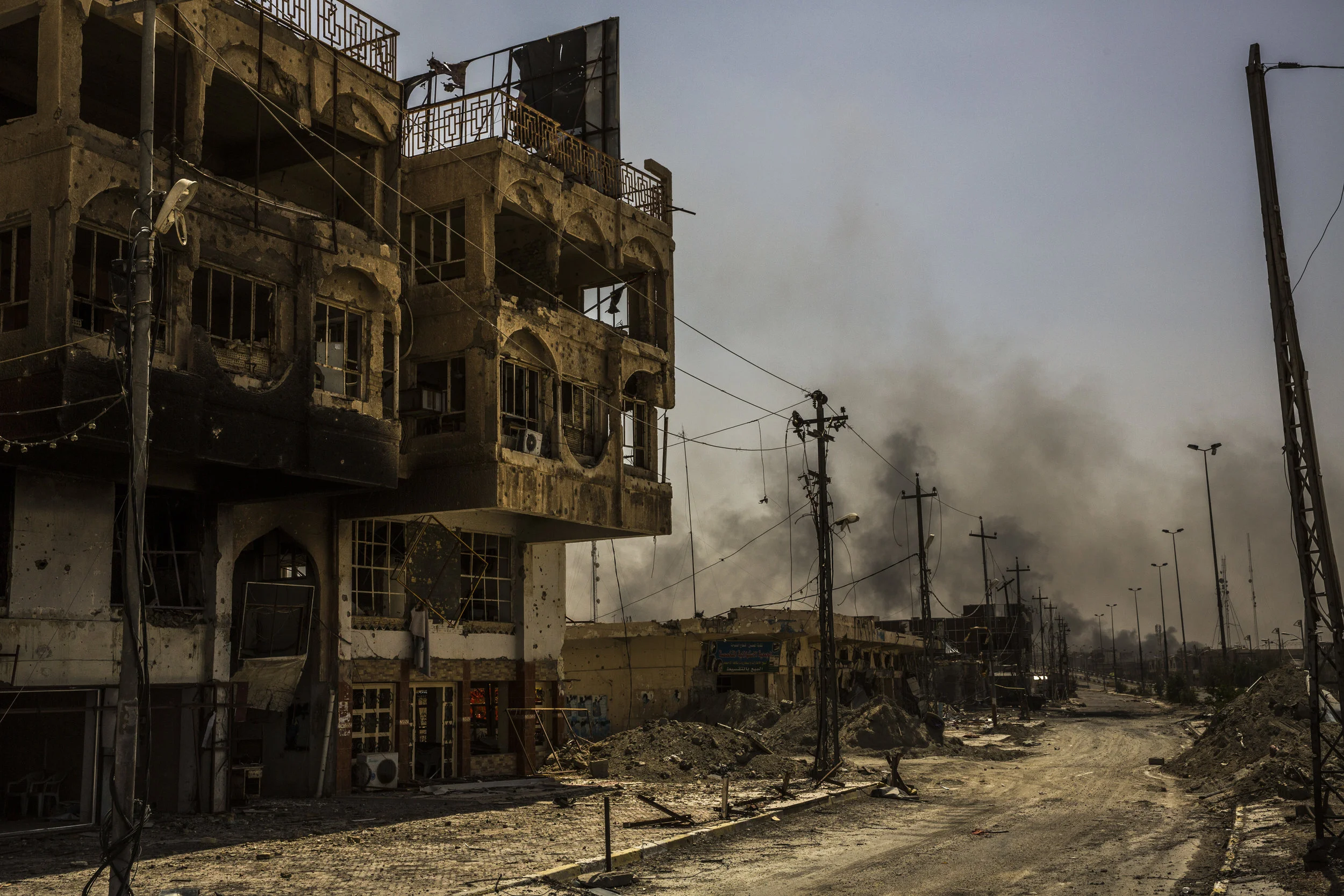  6/27/2016 Fallujah, Iraq  The main road that runs through downtown Fallujah. Much of the area is badly damaged from artillery and heavy fighting. 