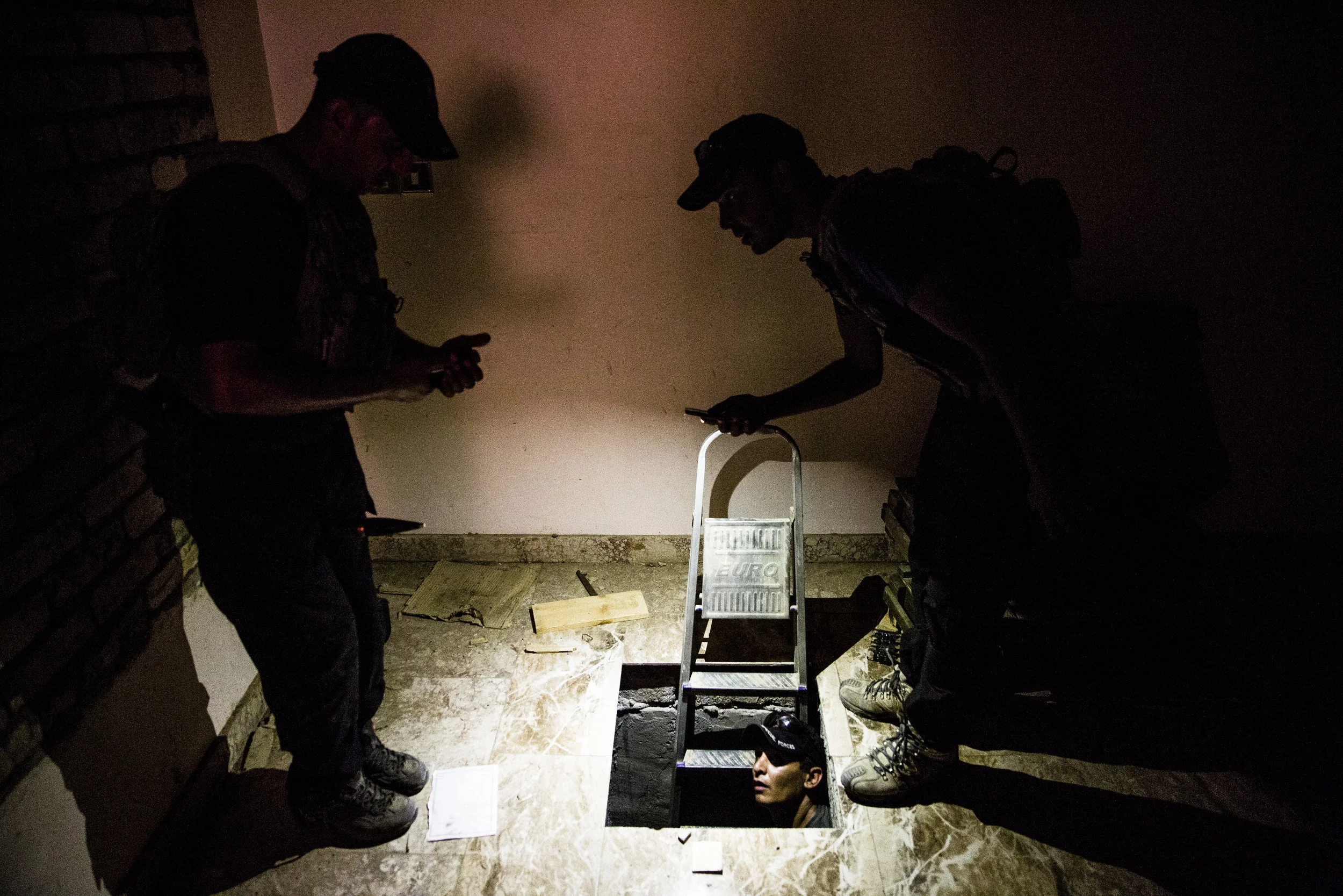  6/24/2016 Fallujah, Iraq  Members of the Iraqi Special Operations Forces, known as the CTF or counter terrorism forces, explored an underground bunker that was built in a large house used by ISIS, in Fallujah, Friday. 